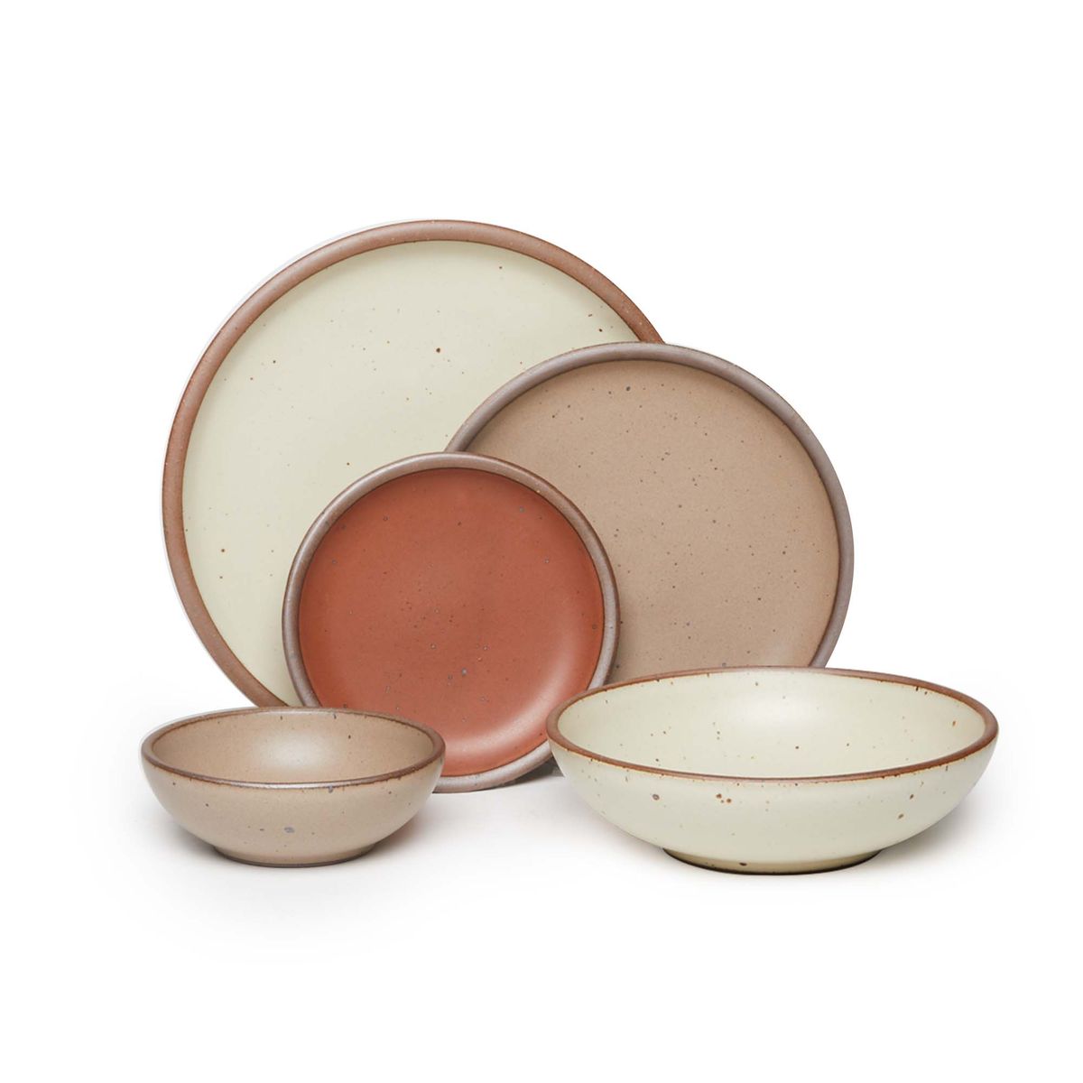 A breakfast bowl, everyday bowl, cake plate, side plate and dinner plate paired together in a warm pale brown, cool terracotta, and warm off-white colors featuring iron speckles