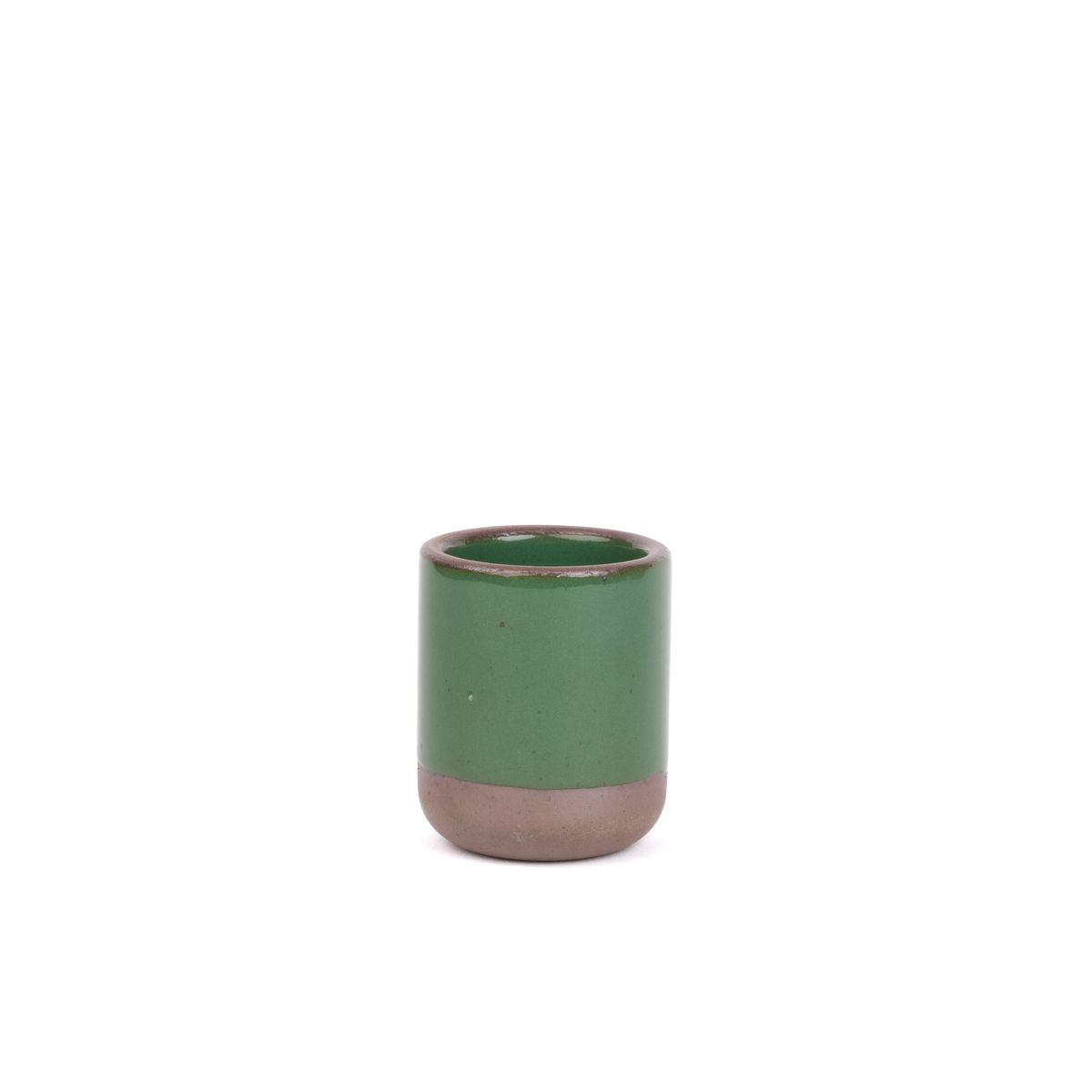 A small, short ceramic mug cup in a glossy emerald green color featuring iron speckles and unglazed rim and bottom base.