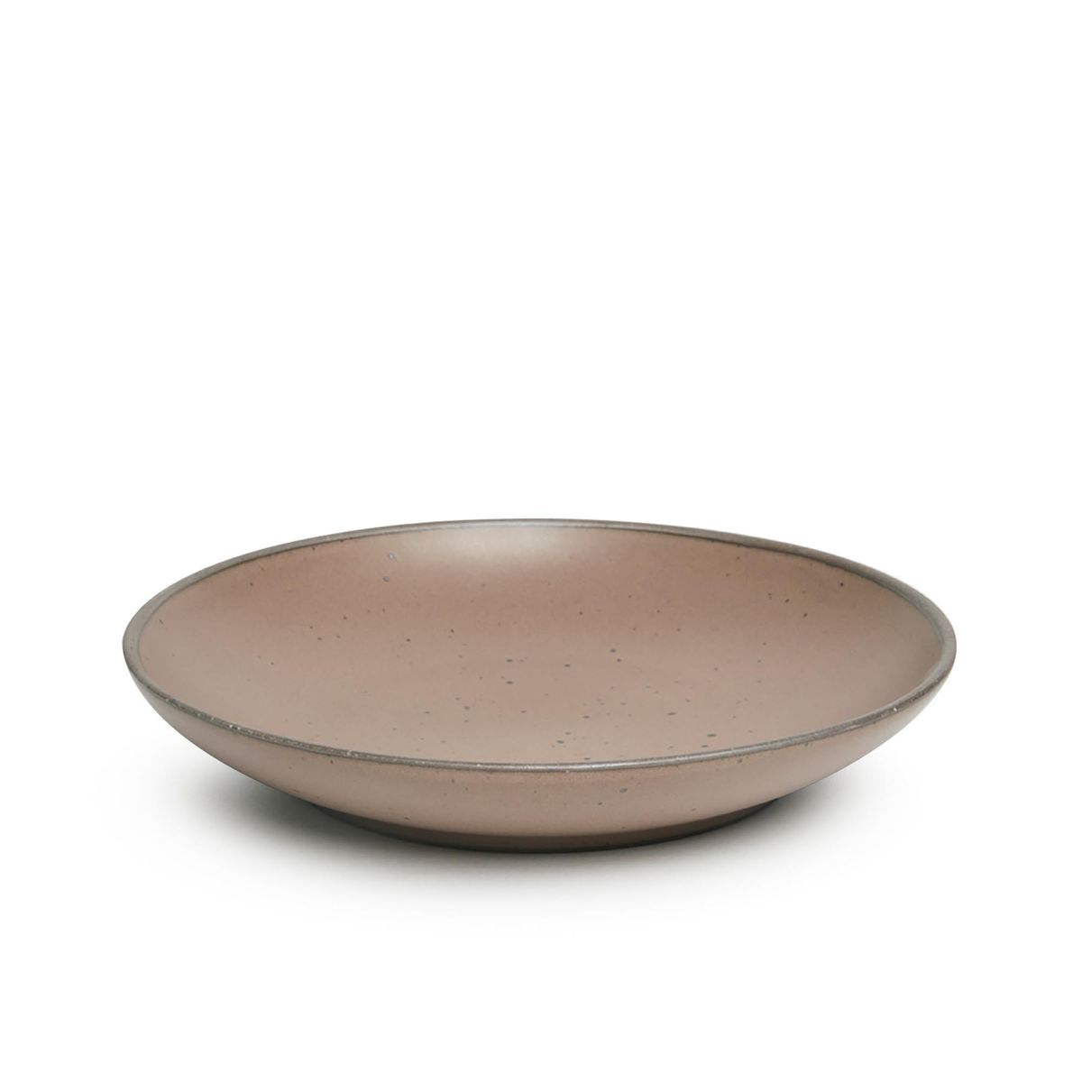 A large ceramic plate with a curved bowl edge in a warm pale brown color featuring iron speckles and an unglazed rim.