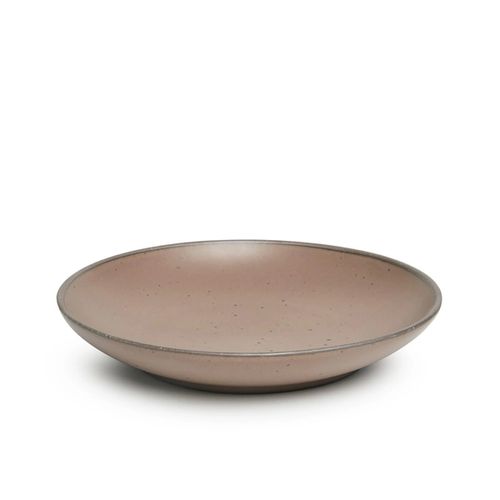 A large ceramic plate with a curved bowl edge in a warm pale brown color featuring iron speckles and an unglazed rim.