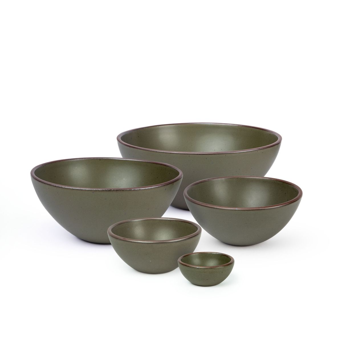 A bitty bowl, ice cream bowl, soup bowl, popcorn bowl, and mixing bowl in a pine green color featuring iron speckles