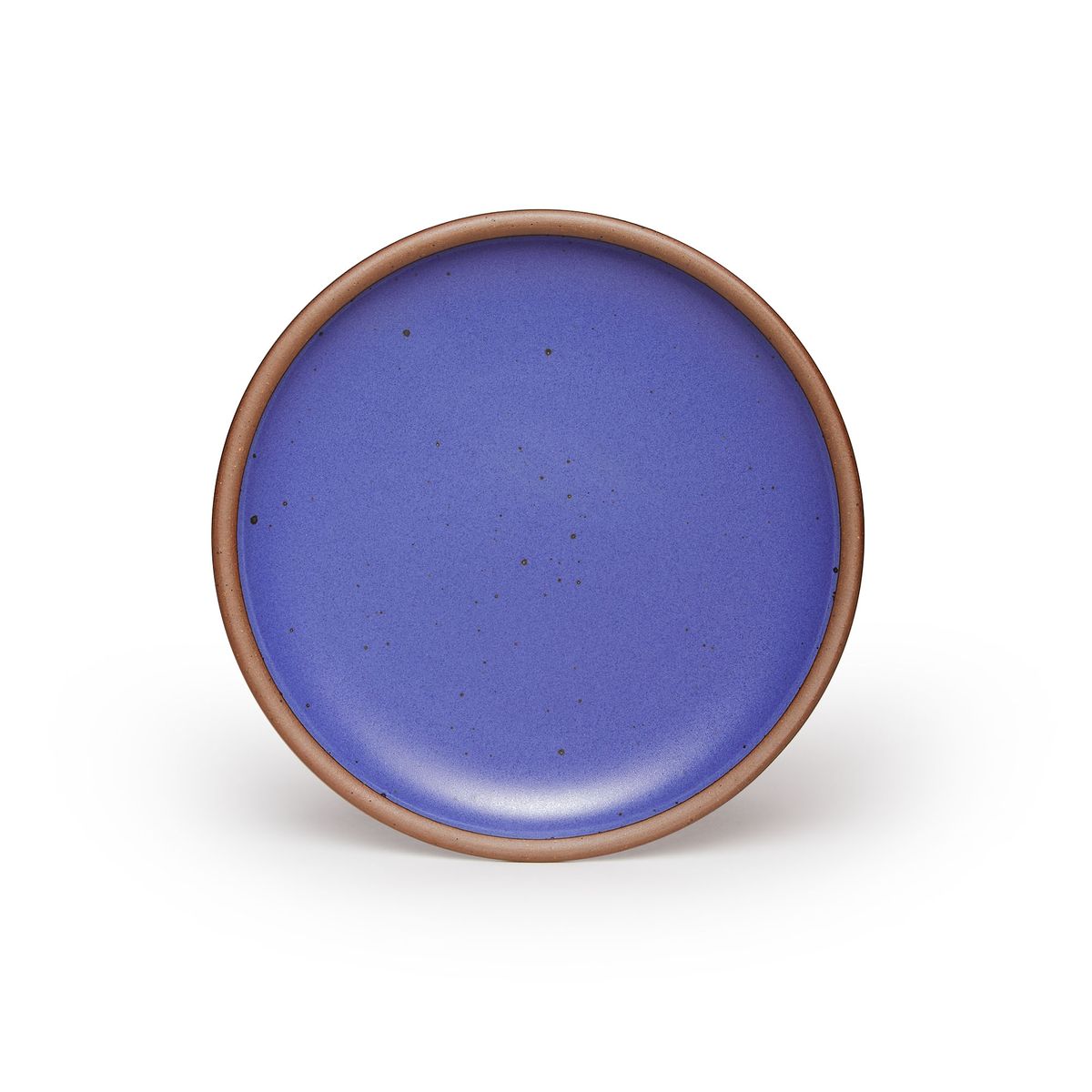 A dinner sized ceramic plate in a true cool blue color featuring iron speckles and an unglazed rim