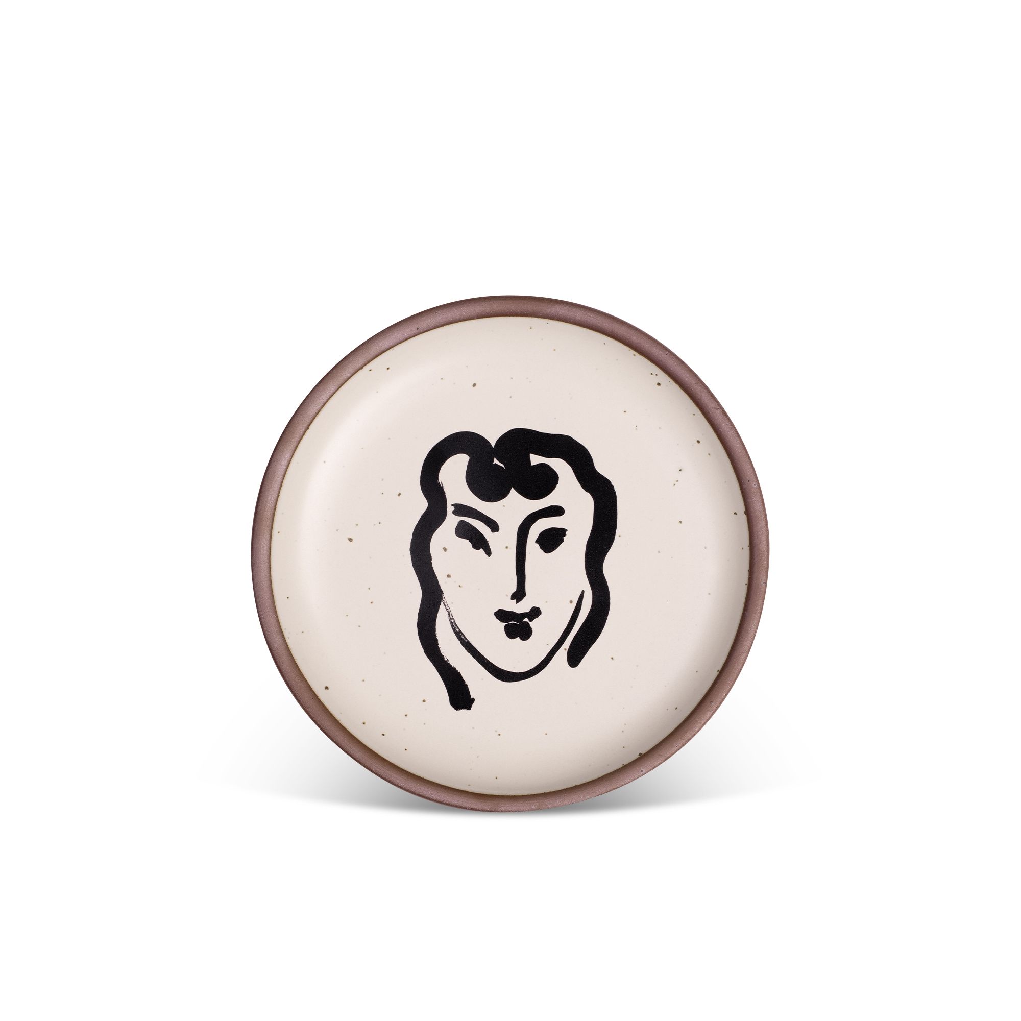 A minimalist black ink decal of a woman's smiling face in an abstract, expressive style centered on an off-white ceramic plate with an unglazed rim.