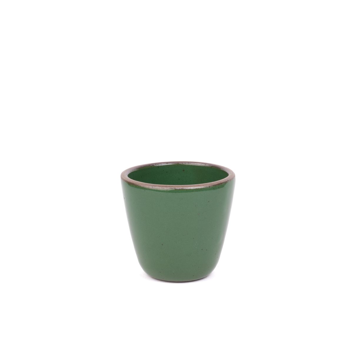 A short cup that tapers out to get wider at the top in a glossy emerald green color featuring iron speckles