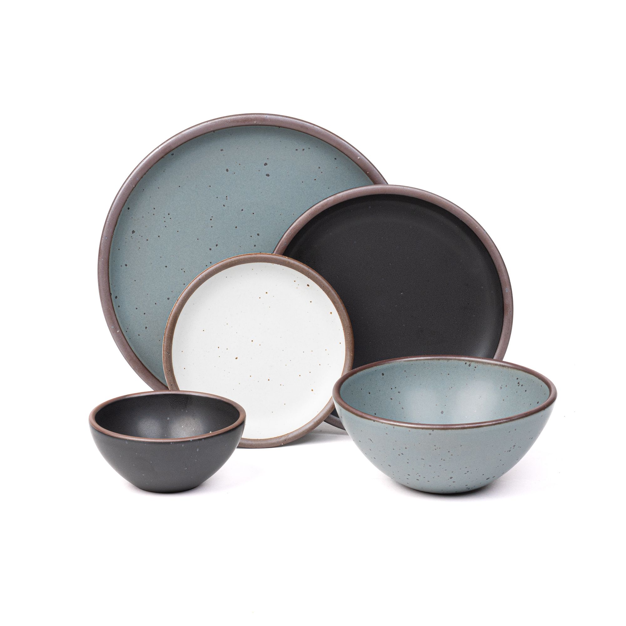 An ice cream bowl and side plate in graphite black, a soup bowl and dinner plate in blue-grey, and a cake plate in a cool white color.