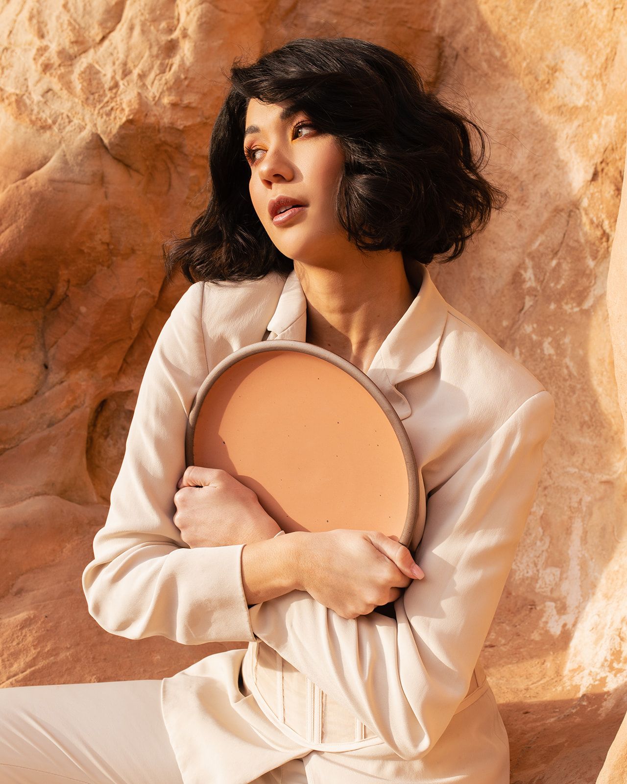Maya Fraser photo of woman holding Utah dinner plate to her chest