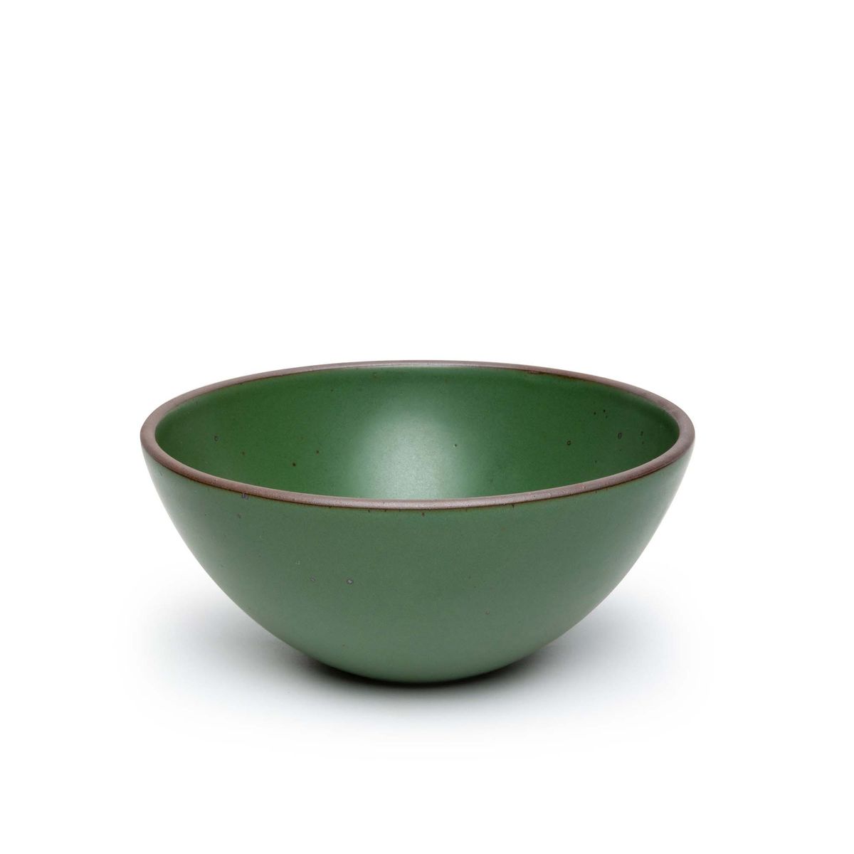 A large rounded ceramic bowl in a deep, verdant green color featuring iron speckles and an unglazed rim