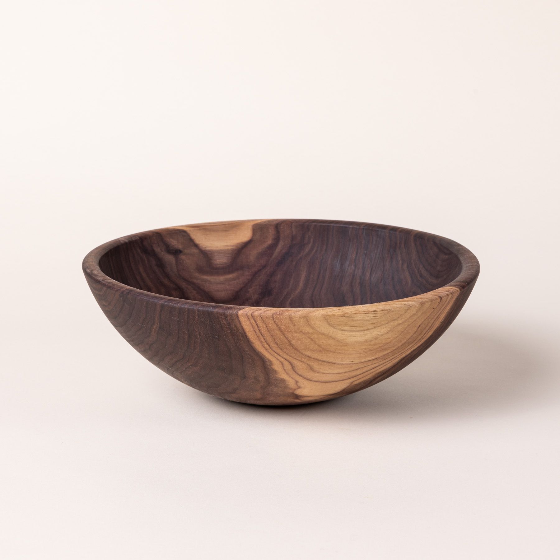 A large walnut wooden bowl