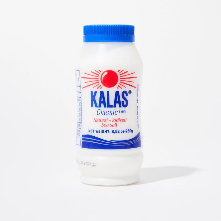 Translucent plastic bottle with a blue lid that reads "Kalas" "Classic" "Natural - Iodized Sea Salt"