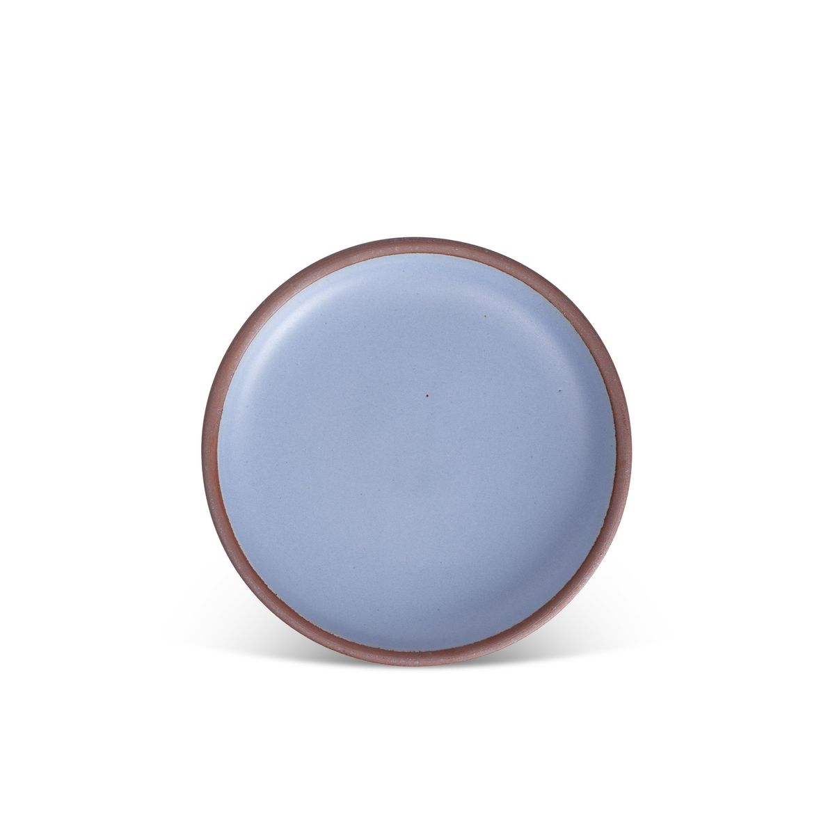 A medium sized ceramic plate in a periwinkle color featuring iron speckles and an unglazed rim.