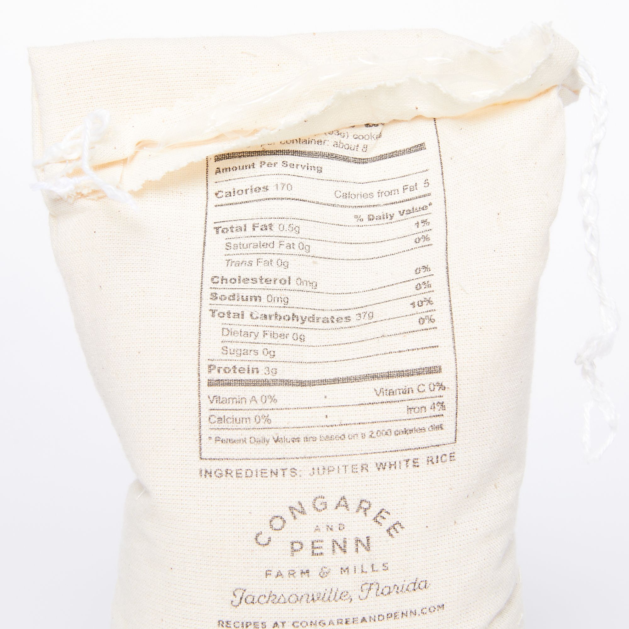 Close up of a cream colored sack printed with nutritional facts