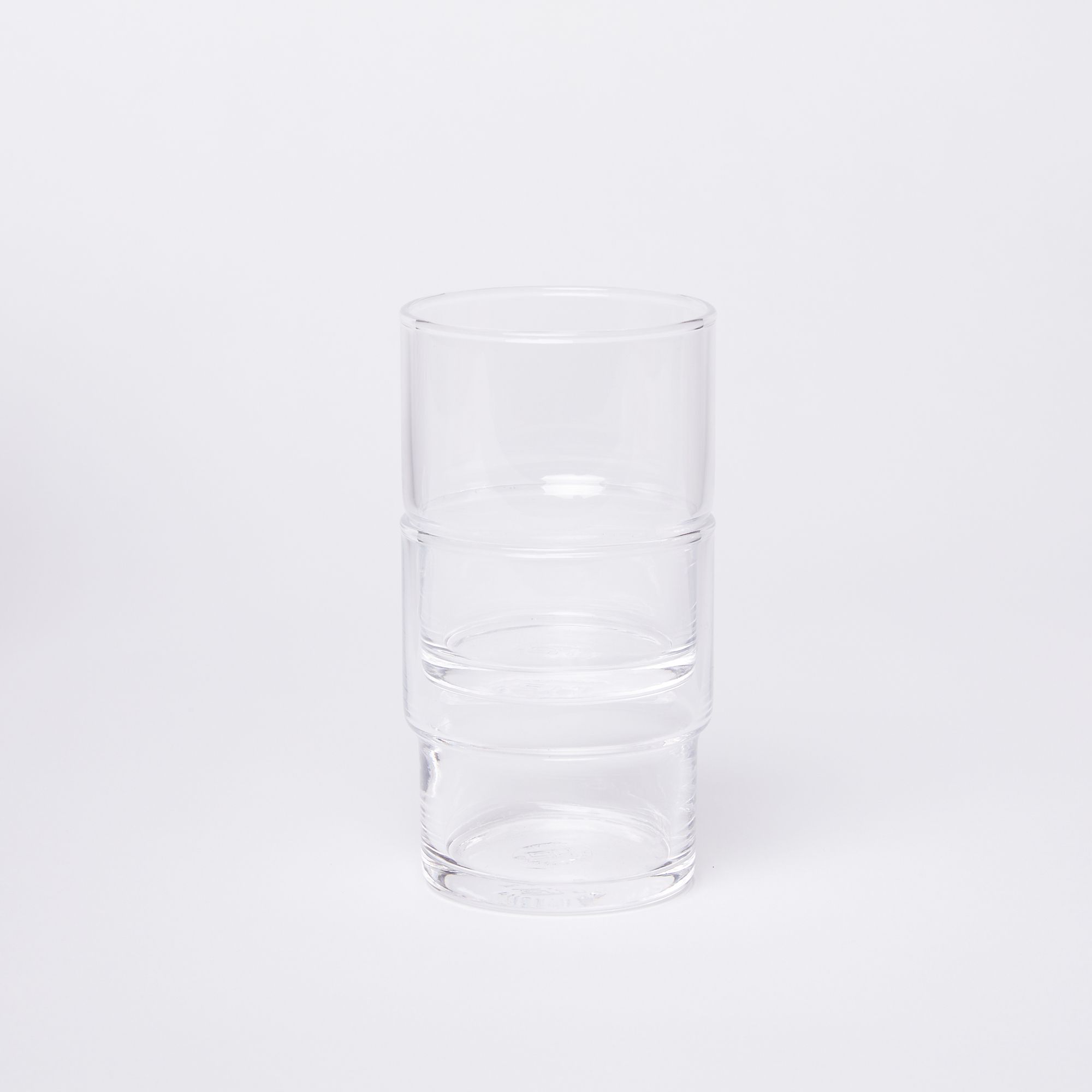 Two clear glasses, stacked