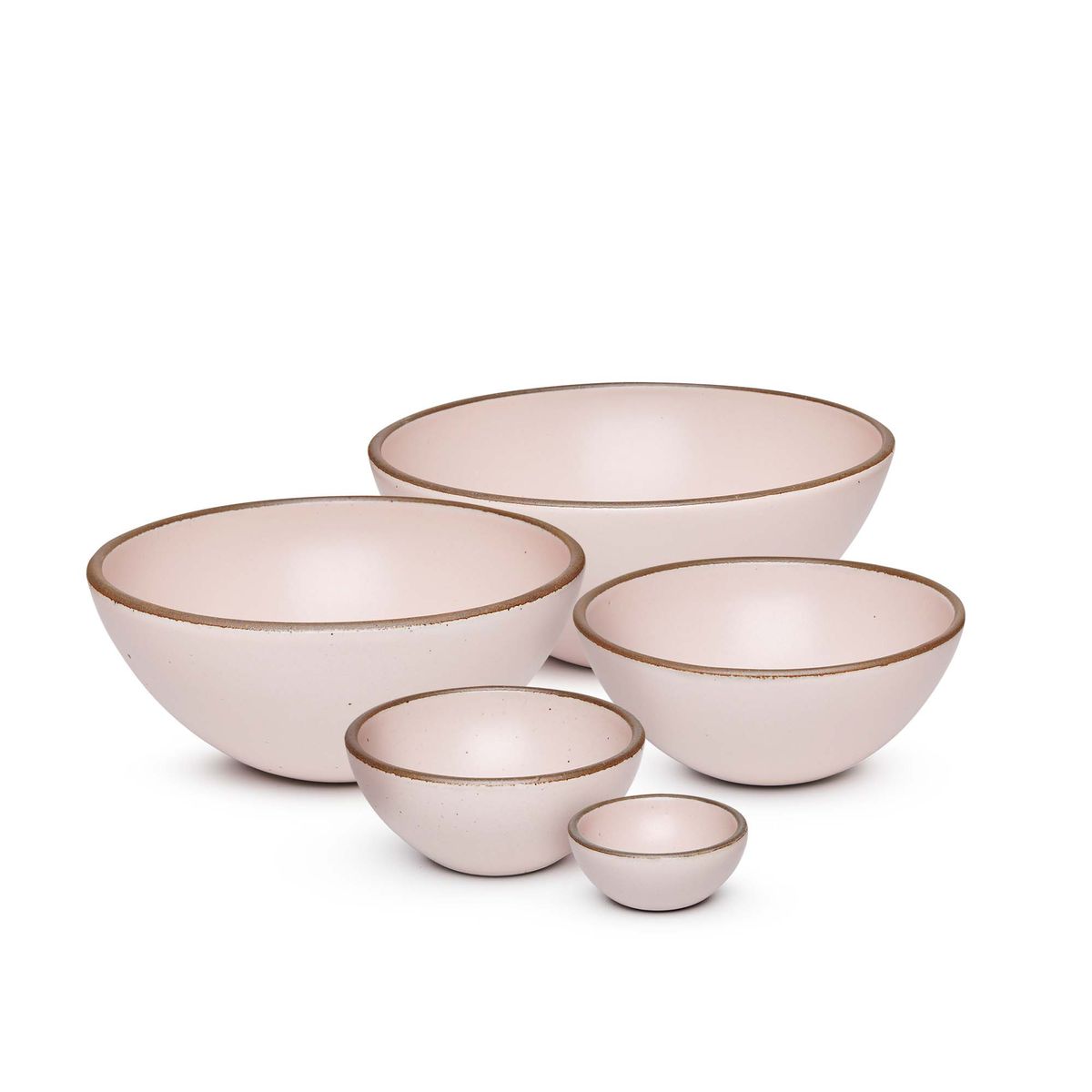 A bitty bowl, ice cream bowl, soup bowl, popcorn bowl, and mixing bowl paired together in a soft light pink color featuring iron speckles