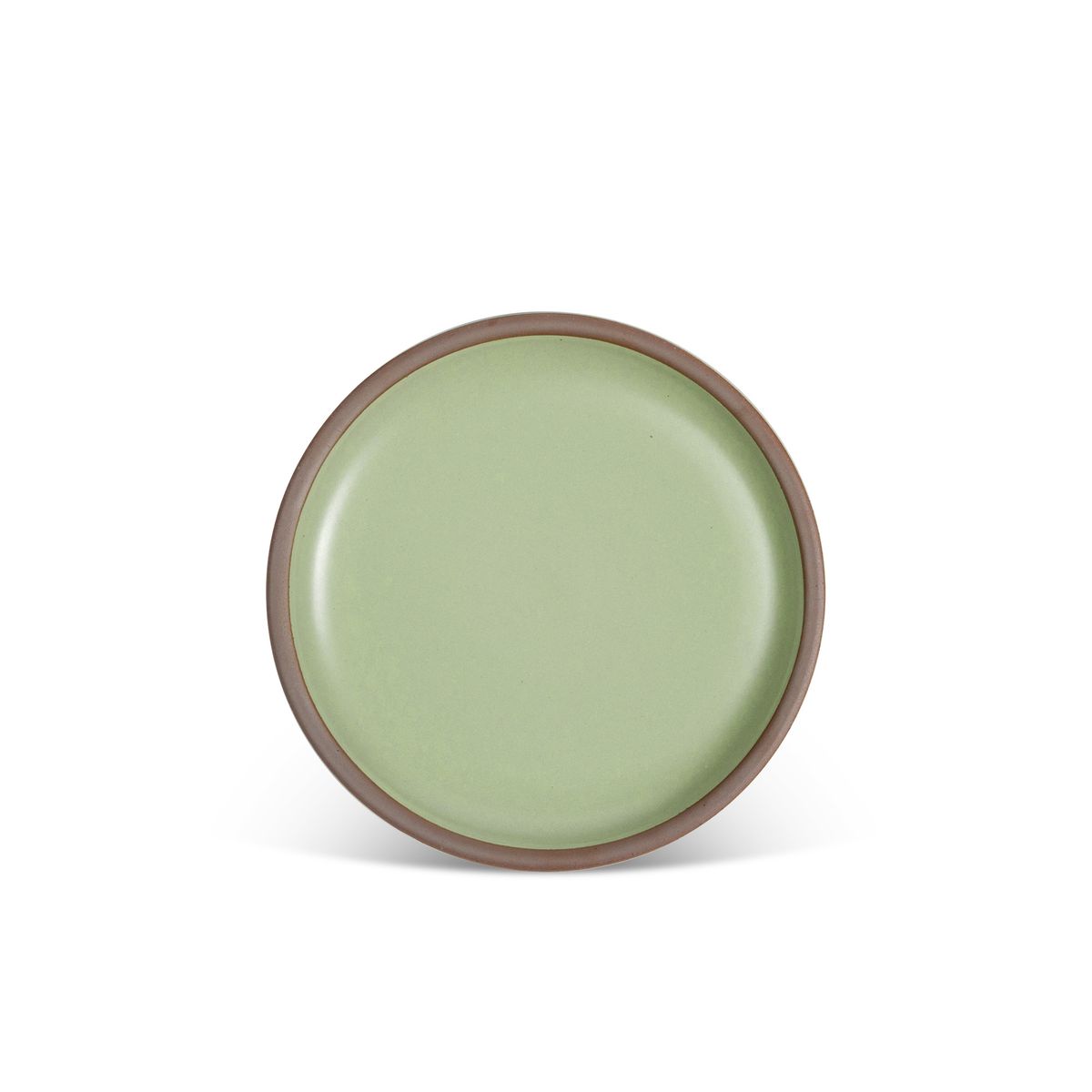A medium sized ceramic plate in a calming sage green color featuring iron speckles and an unglazed rim.