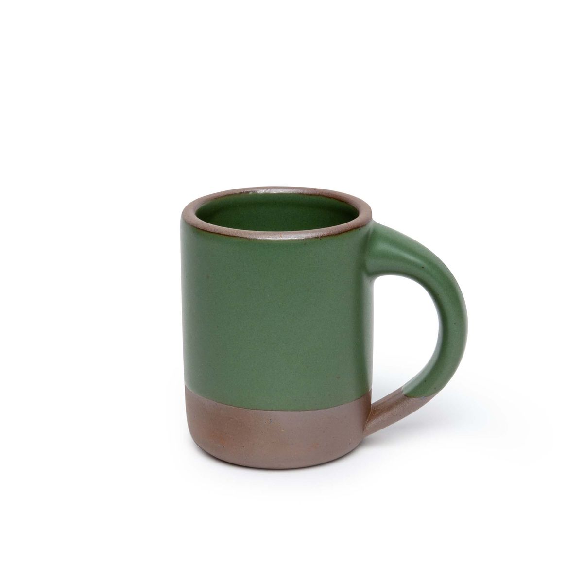 A medium sized ceramic mug with handle in a deep, verdant green color featuring iron speckles and unglazed rim and bottom base.
