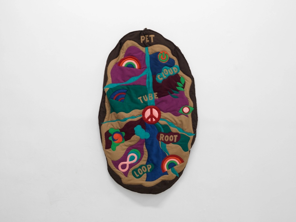 Slide 3/5: Angelo Plessas, Potato Earth Theory (P.E.T.): A Cosmology of Roots in Silence, 2025, quilt, 128 x 82 cm. Photo by Stathis Mamalakis.