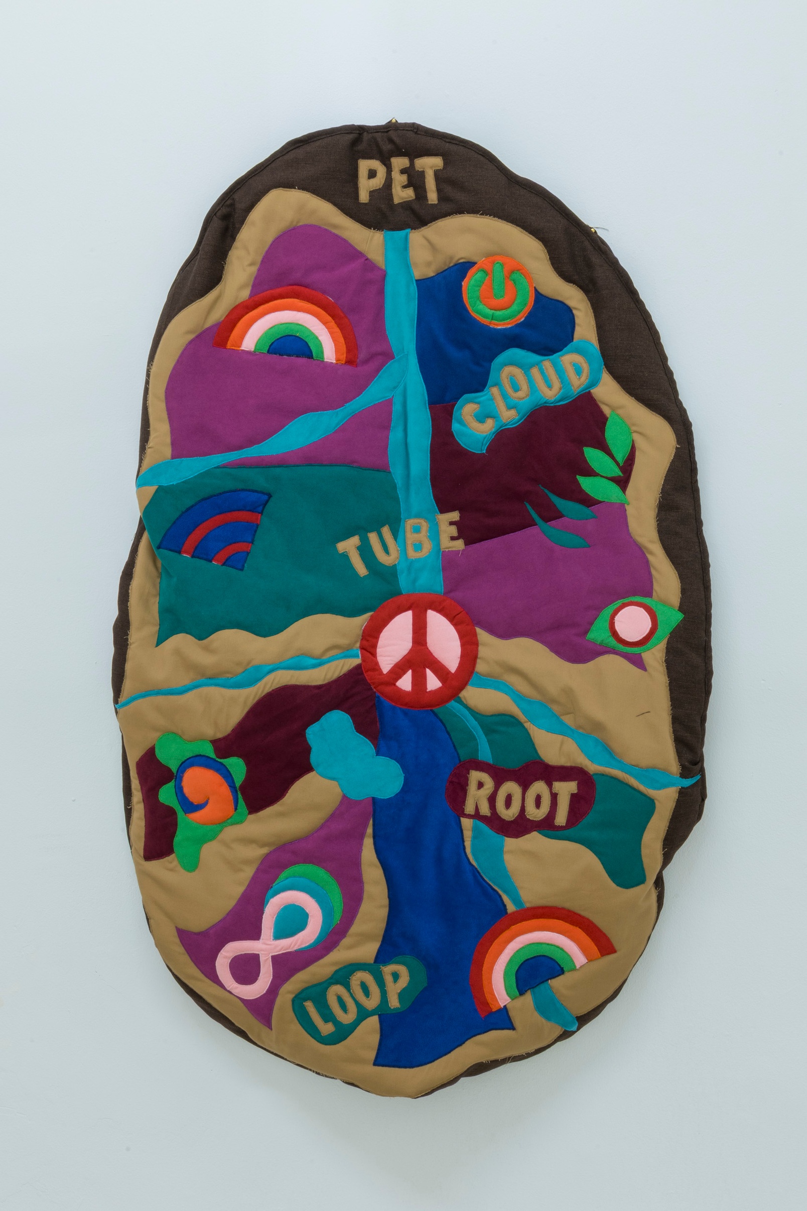 Slide 2/28: Angelo Plessas, Potato Earth Theory (P.E.T.): A Cosmology of Roots in Silence, 2025, quilt, 128 x 82 cm. Photo by Nefeli Papaioannou.