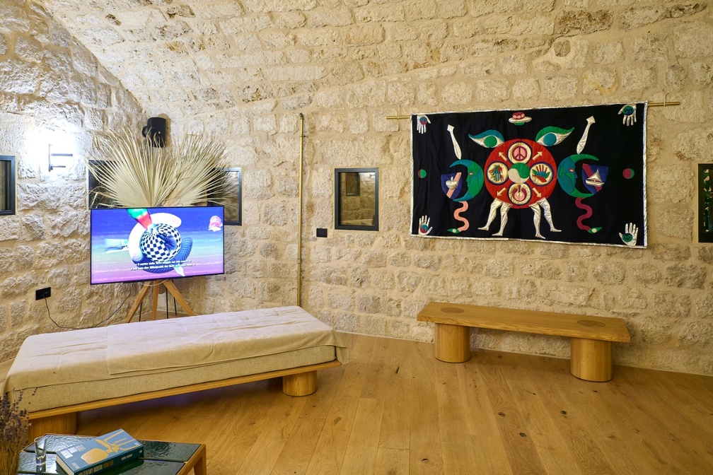 Slide 1/13: Angelo Plessas, Mandala System, 2023, quilt, 200 x 115 cm and Meditation of All Beings, video, duration 9:30 min, 2022, installation view. Photo by Dusko Miljanic. 
