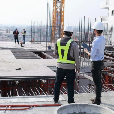people working on rooftop for construction