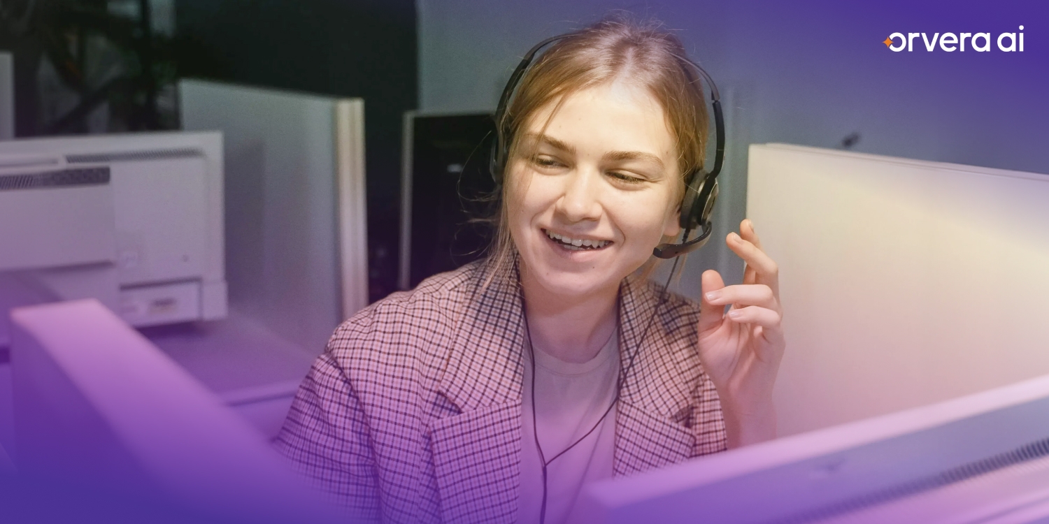Orvera customer support agent wearing a headset and assisting callers in a modern AI-enabled contact center environment.