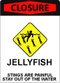 Box Jelly Closure Icon A sign with bold, red lettering at the top that says "Closure" and iconography depicting a swimmer surrounded by jellyfish. Text at the bottom says: "Jellyfish. Stings are painful. Stay out of the water."