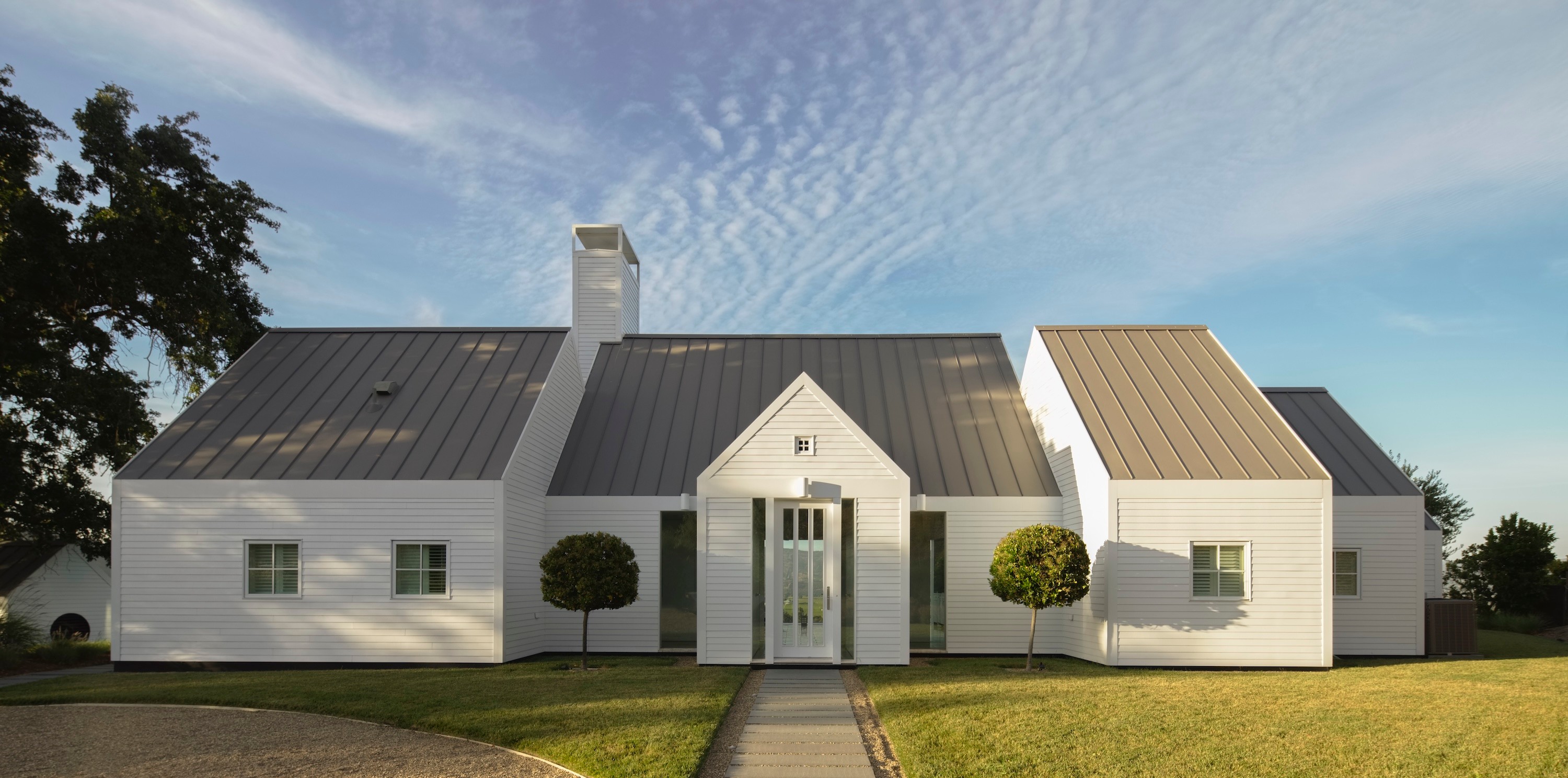 Centric General Contractors Construction and Build California The Birdhouse Exterior Front Clouds Backdrop