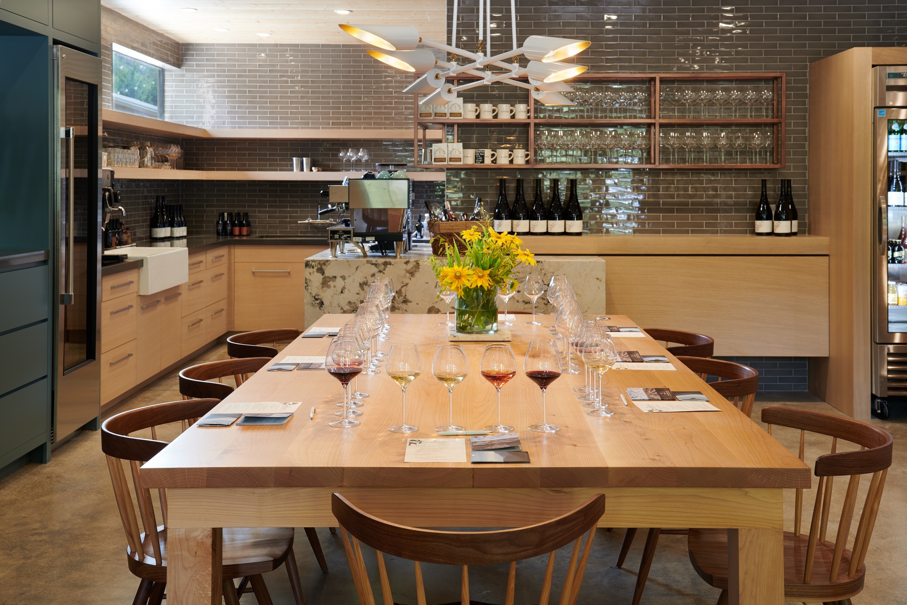 Centric General Contractors Construction and Build California LMR Tasting Room Interior Large Table Shelvingview