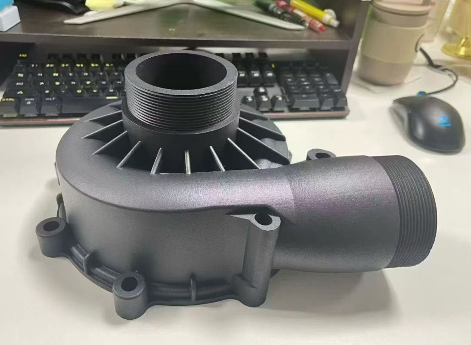 Custom nylon pump housing with 20 percent carbon fill