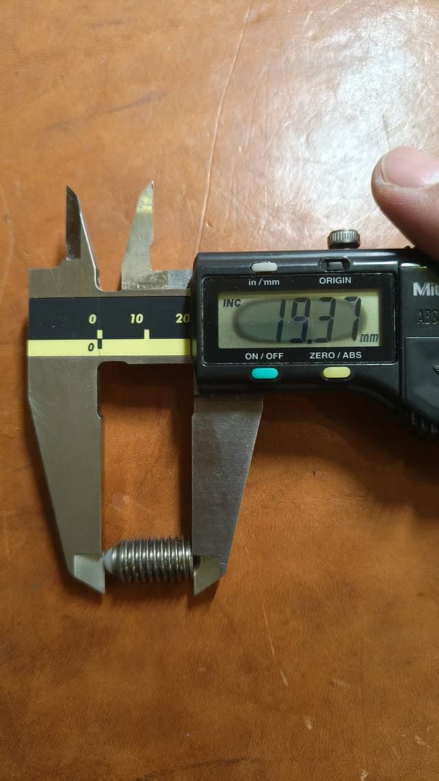 Caliper showing an approximate 19.37 millimetre length for the sample