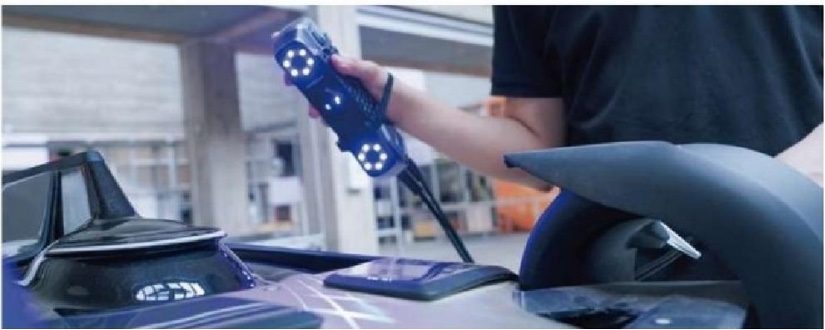 Handheld 3D scanner capturing an aerospace model component