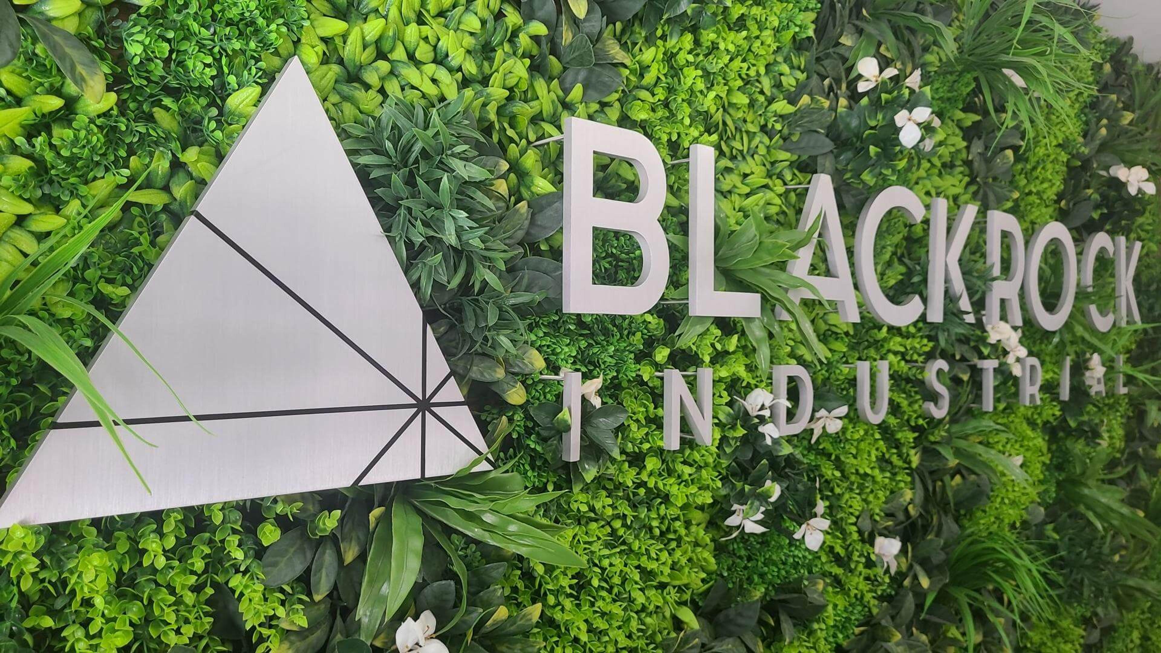 Blackrock Industrial logo on a green living wall