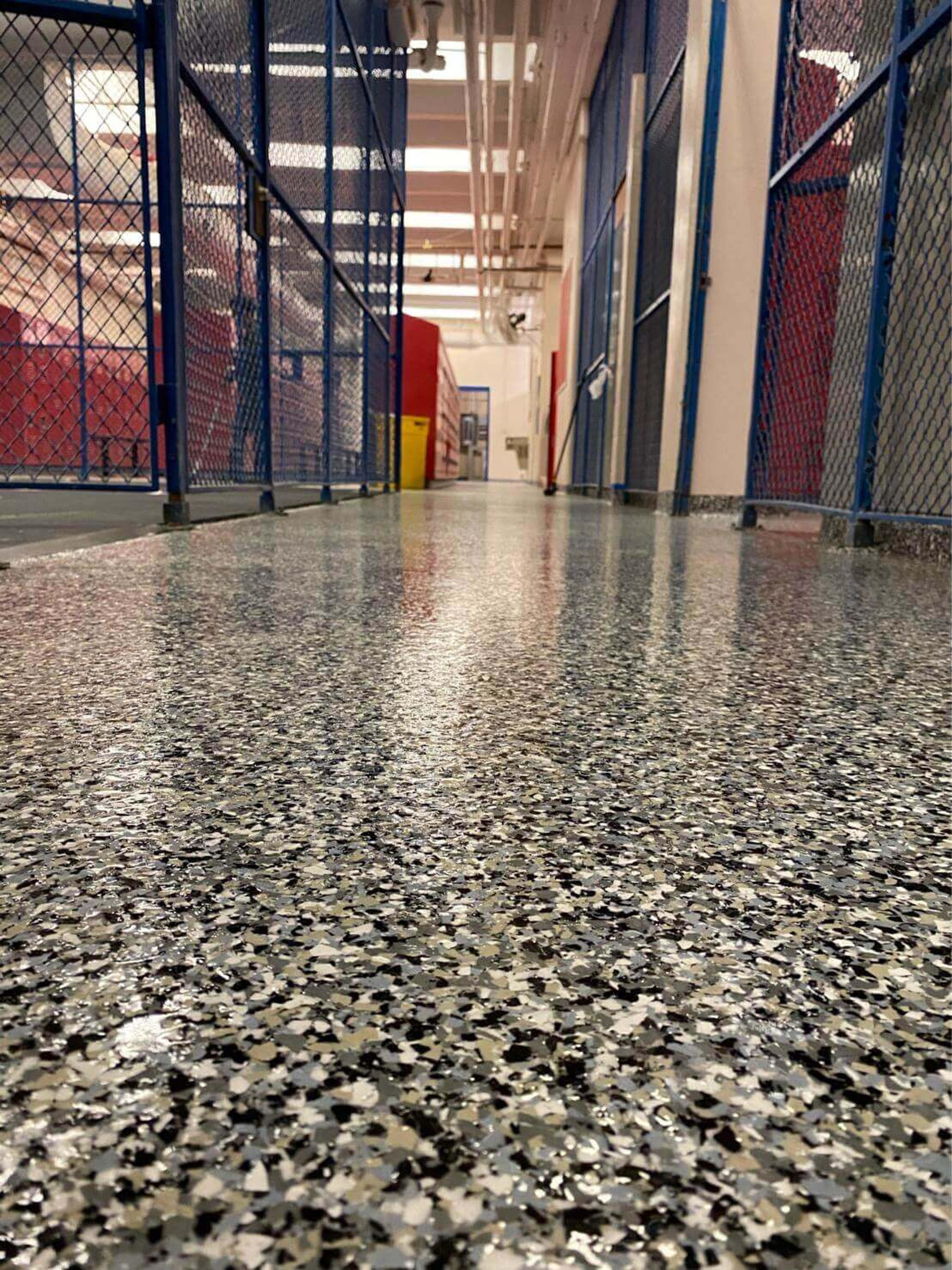 Speckled flake epoxy floor in a secured storage area