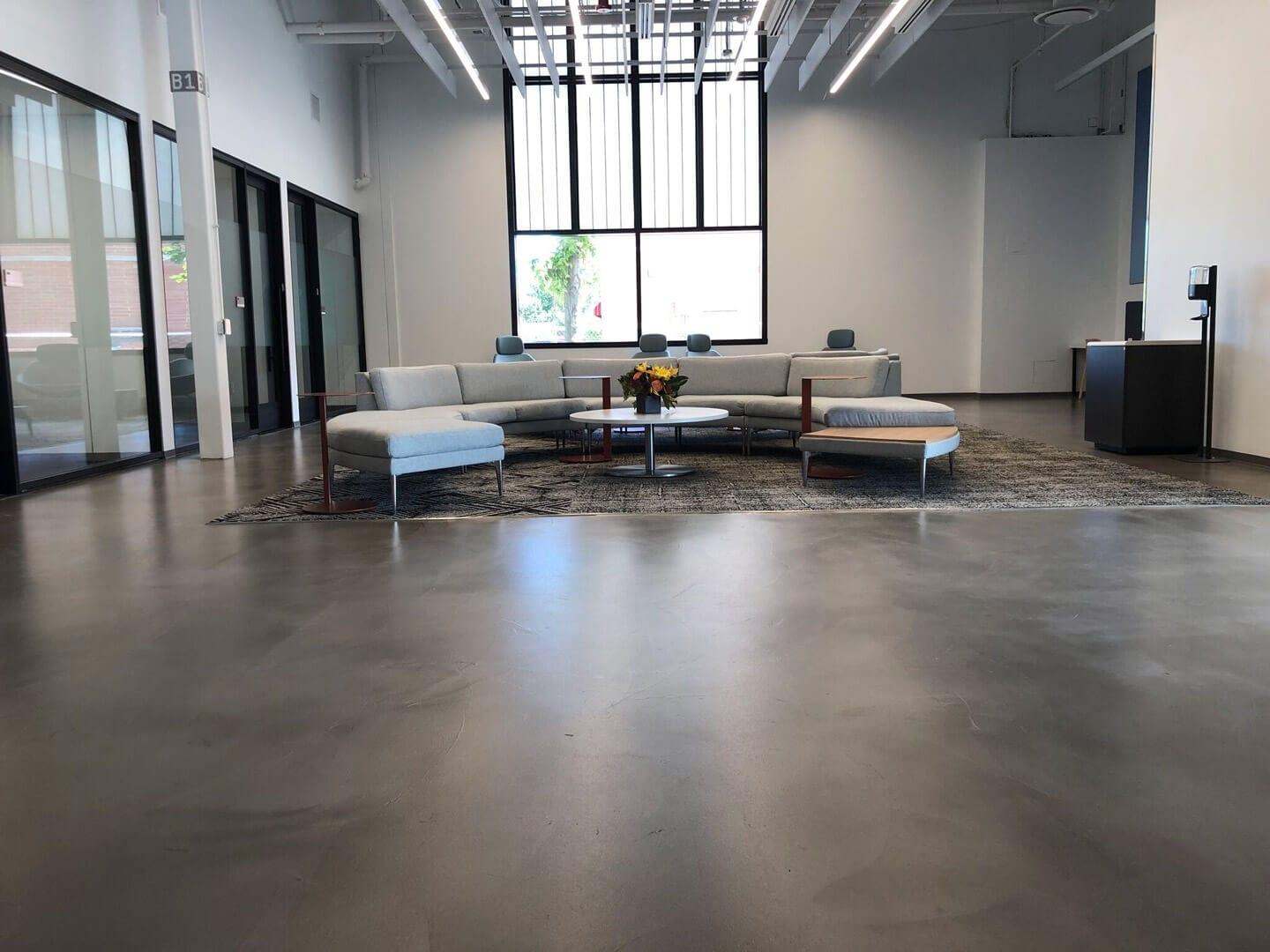 Polished concrete floor in a modern office lounge