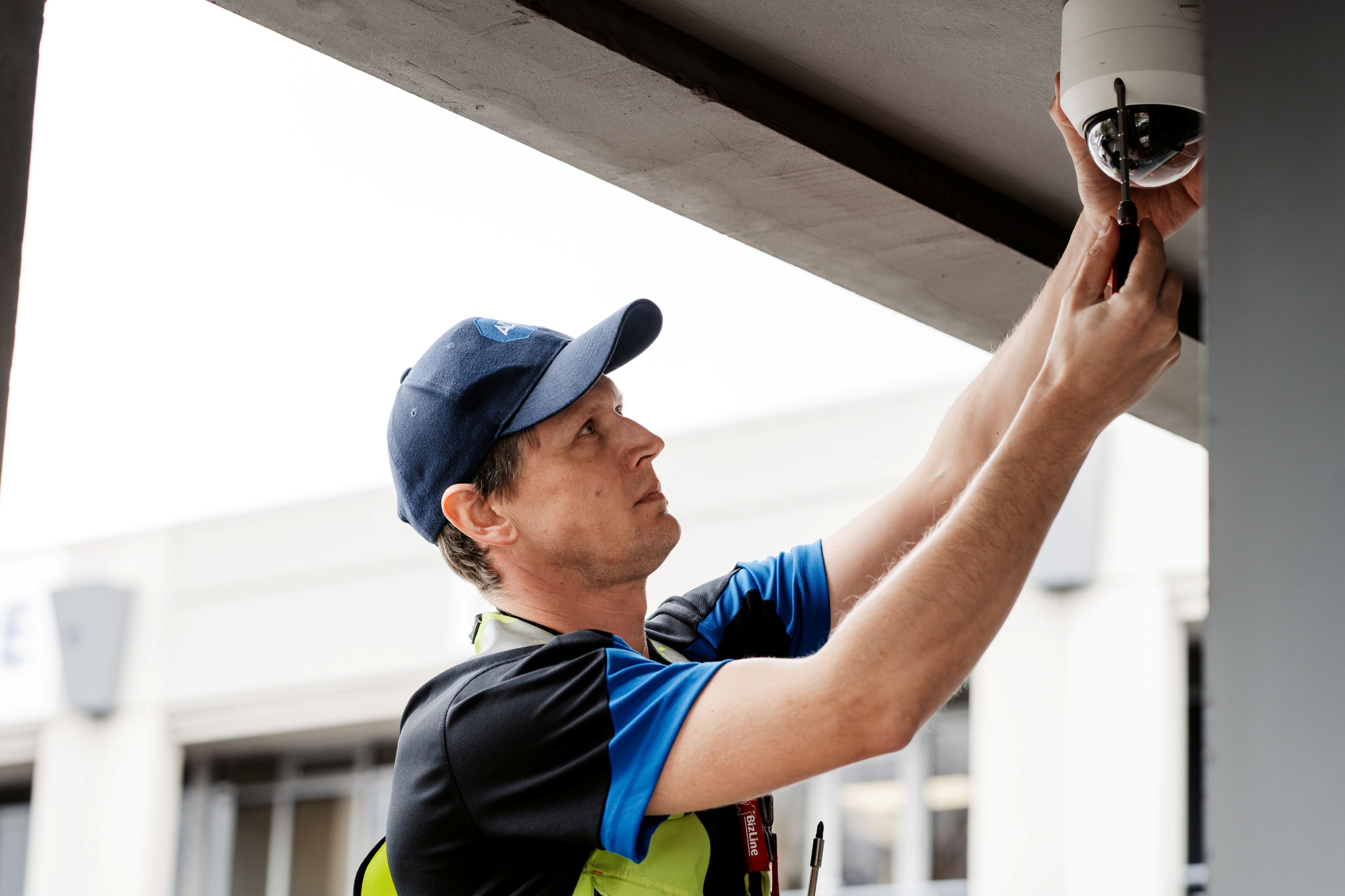 ADT tech working on camera