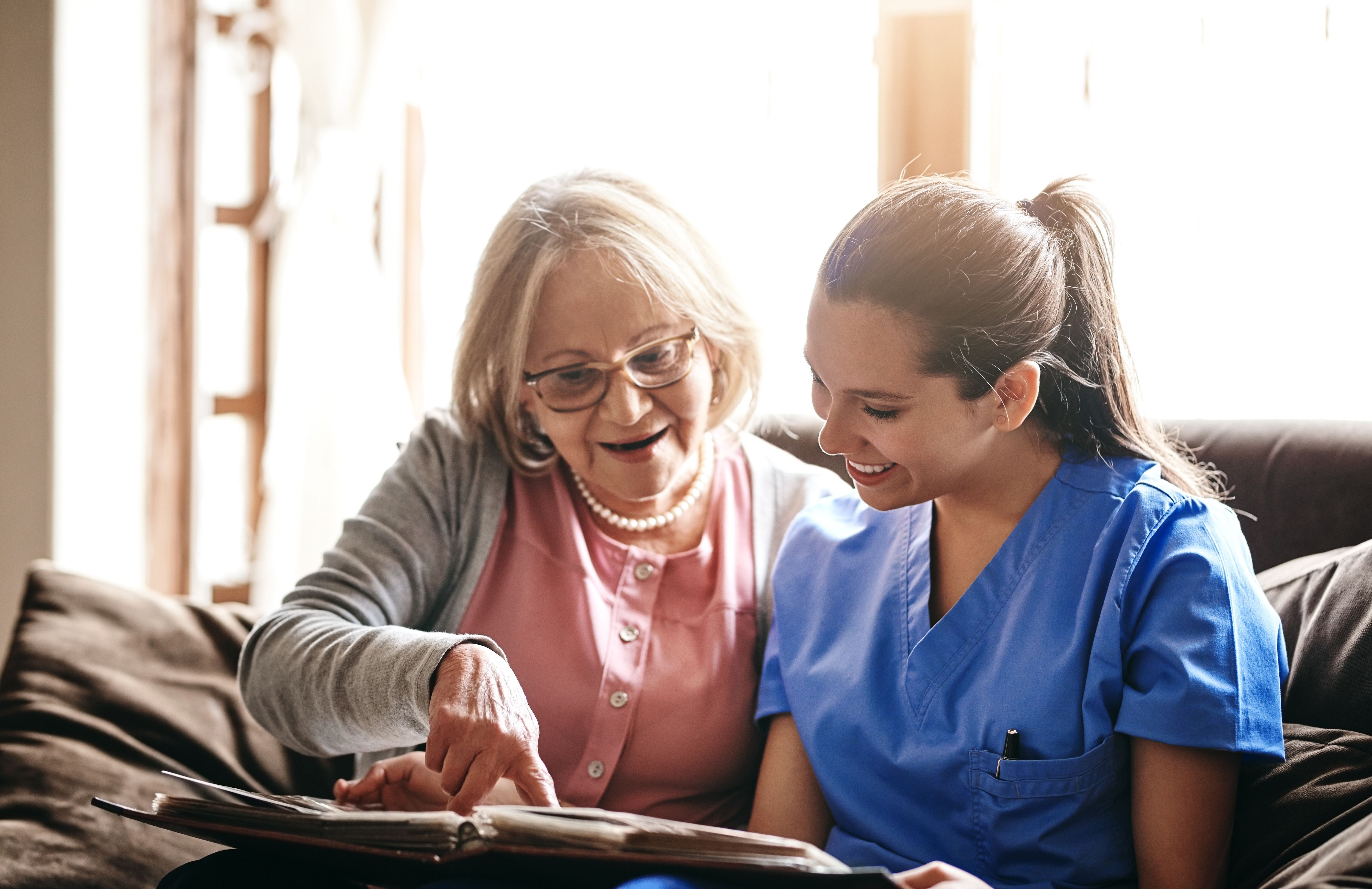 Two personal alarm devices, separate with black and white colours