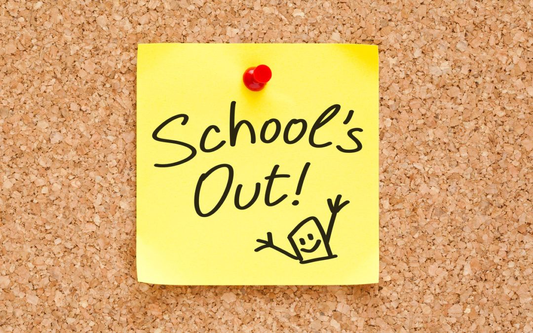 A yellow note labelled 'School's Out!' and pinned to a board