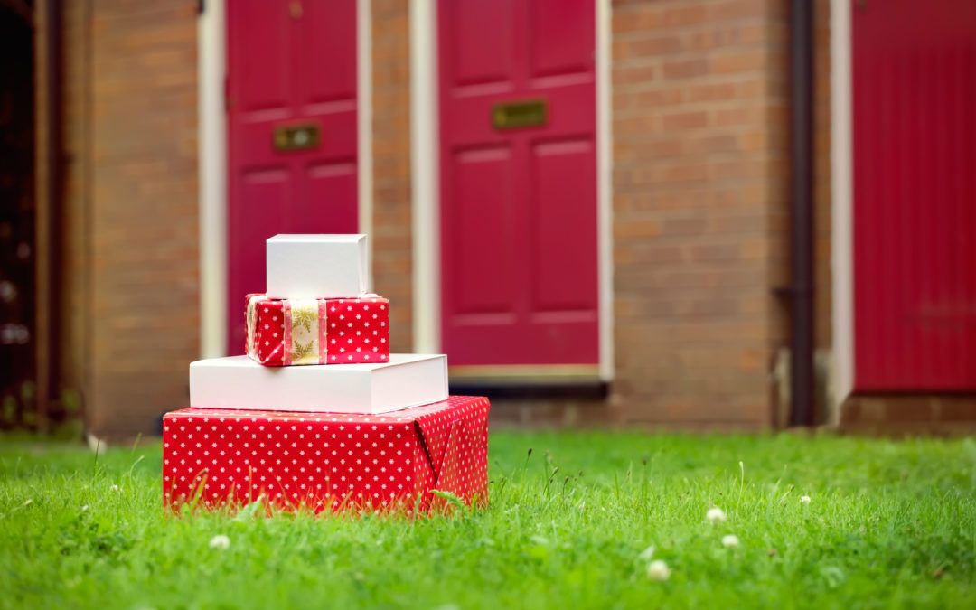Stack of Christmas presents on a lawn