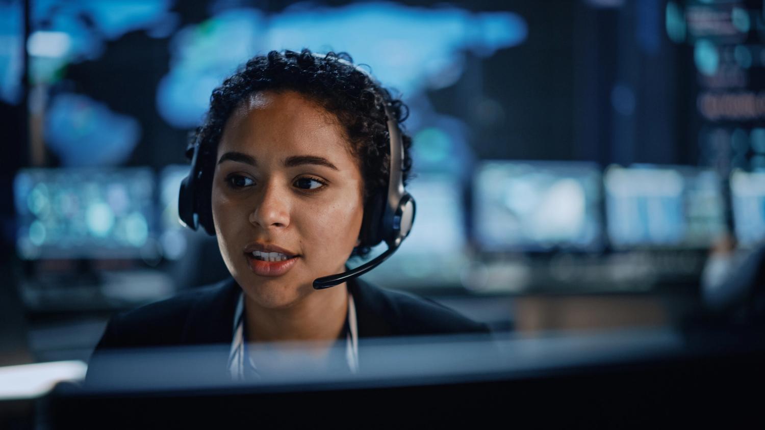 female security surveillance employee with headset