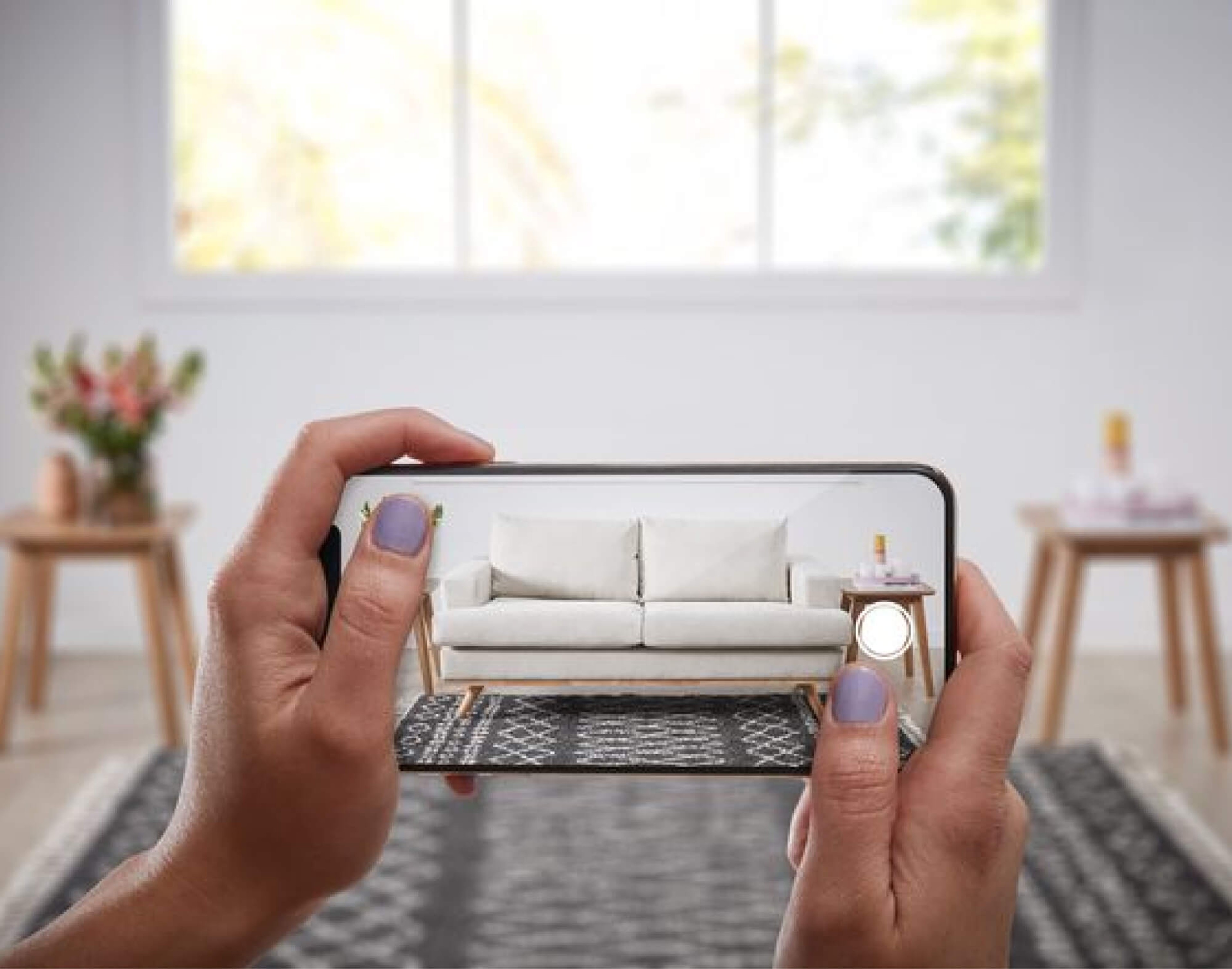 A 3D render of a couch as viewed on a mobile device