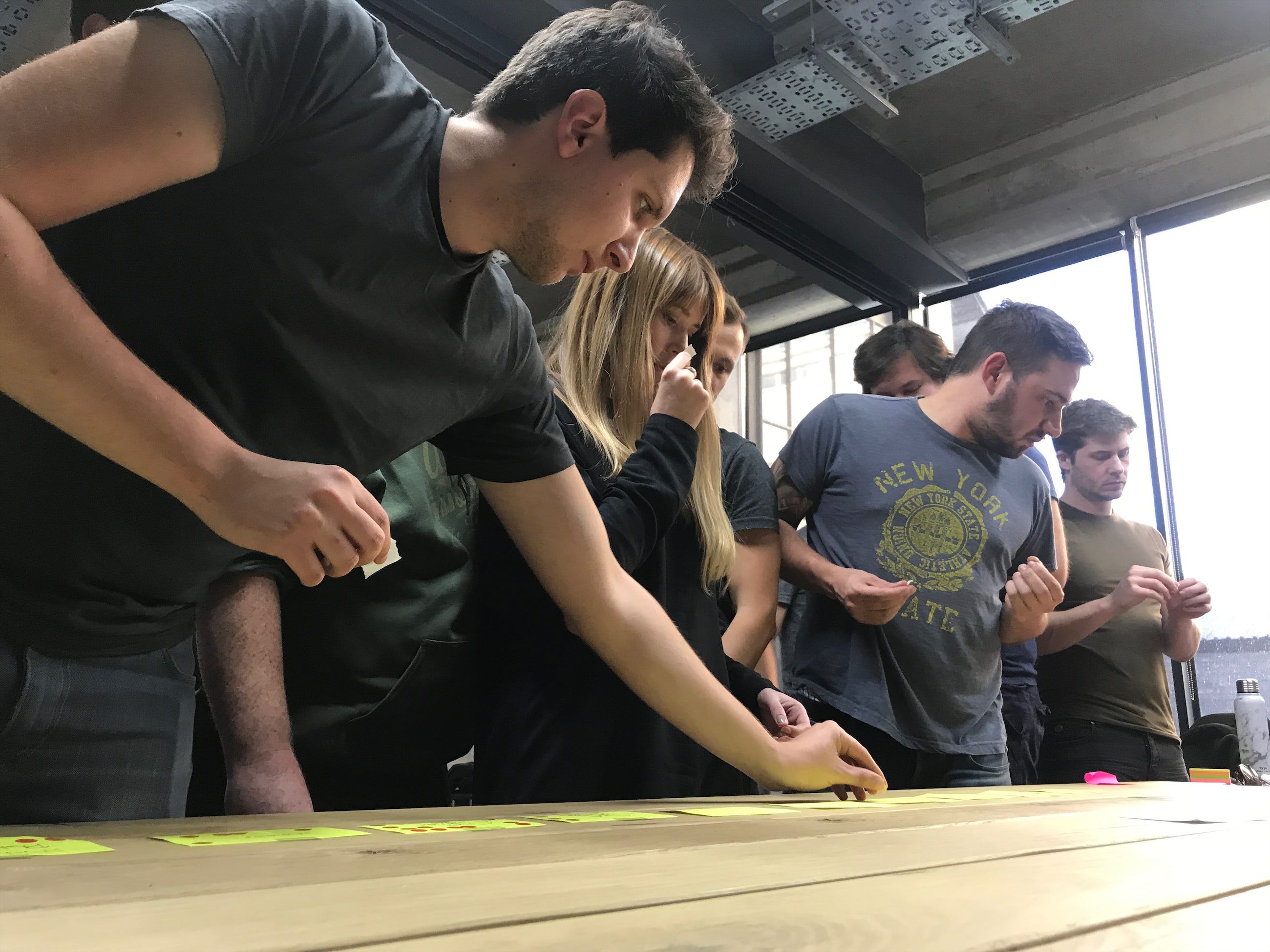 Petr Pavlik, an iOS developer, voting on a card.