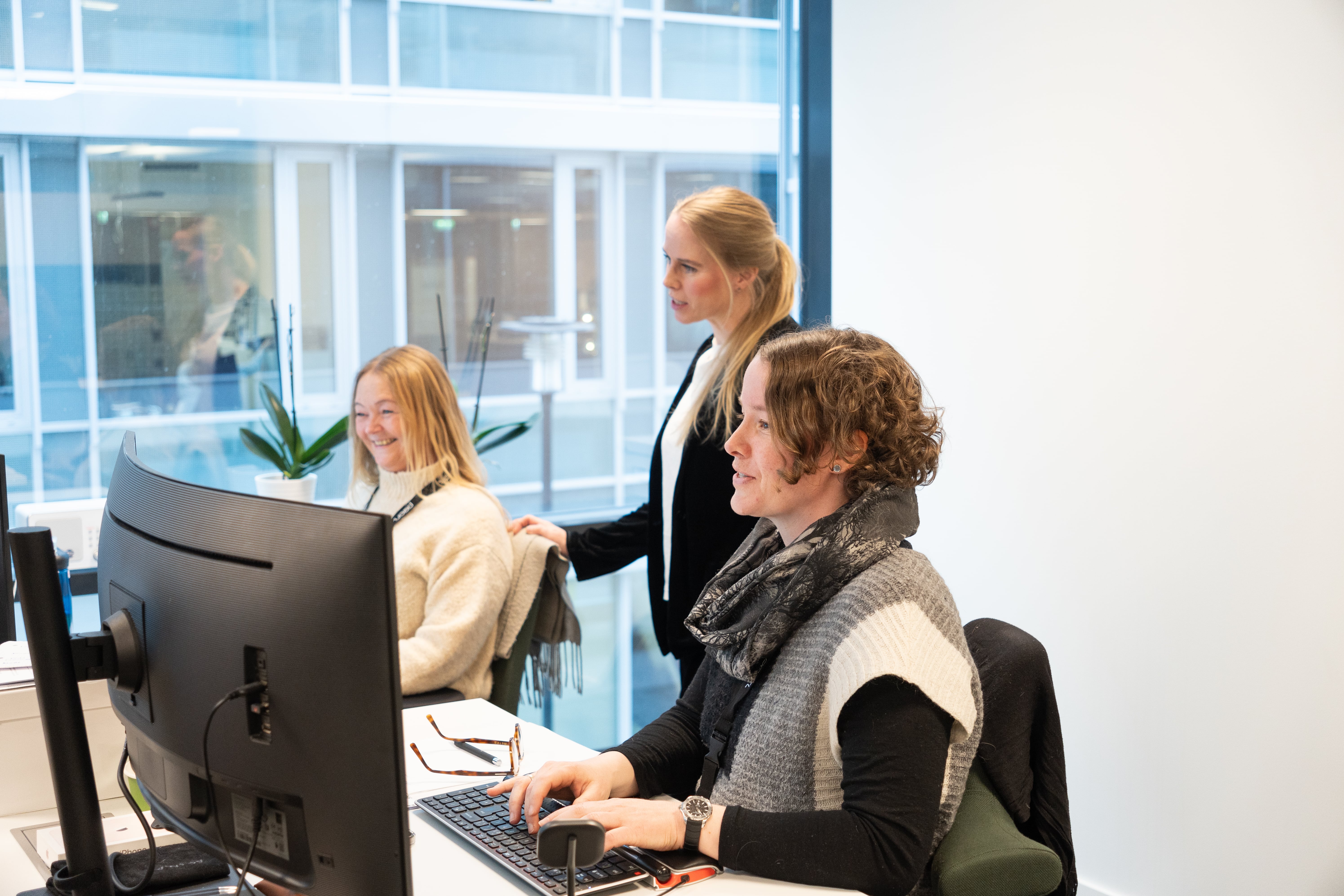 Three women at work.