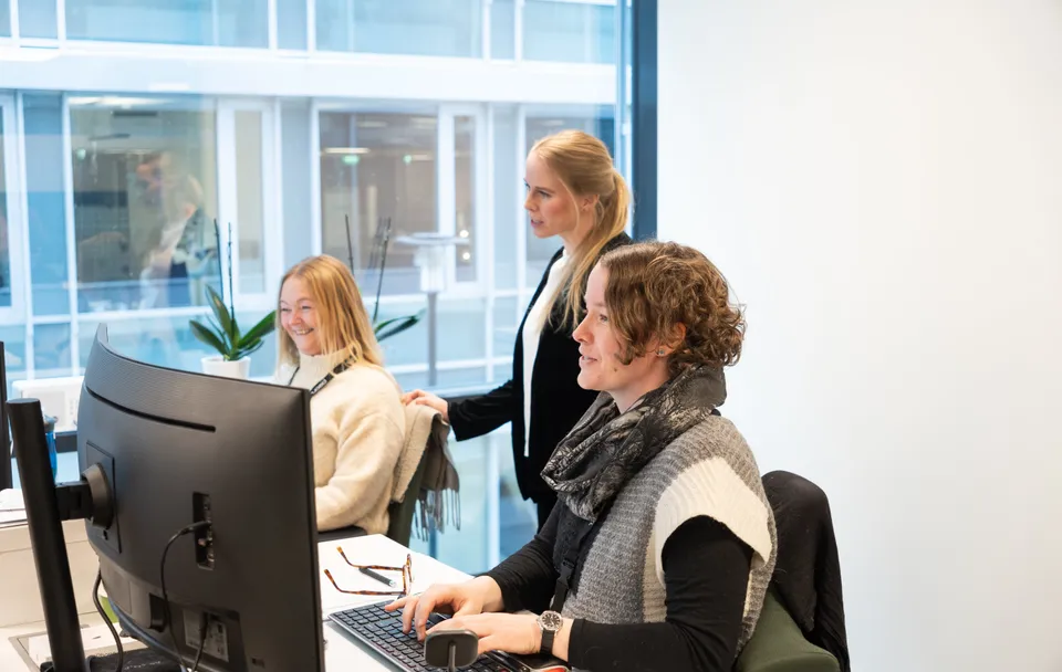 Three women at work.