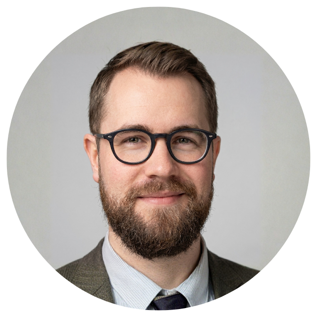Man with a beard and glasses