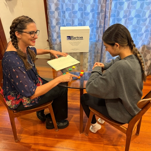 Tutor with child