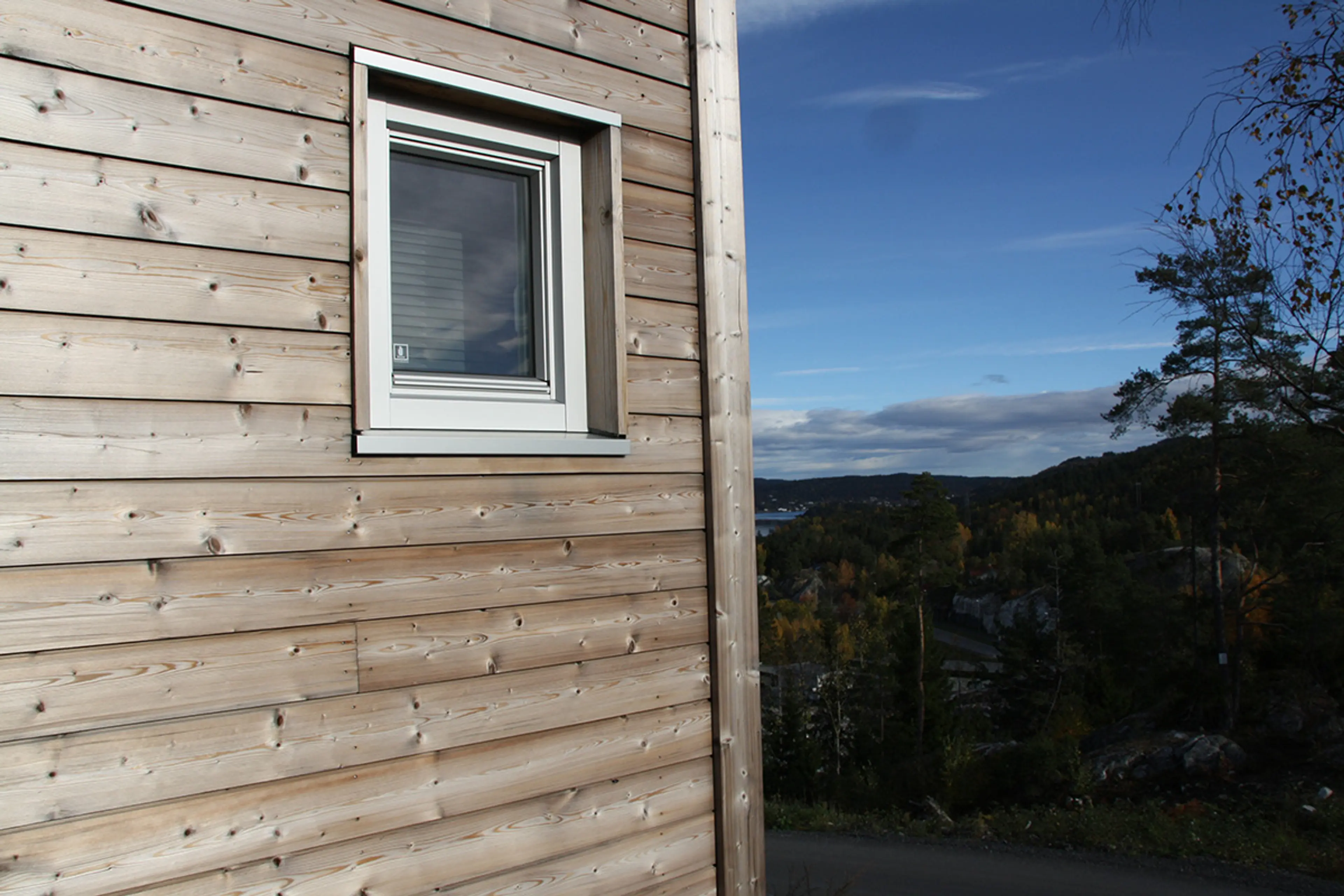 husfasade med kledning av termogran