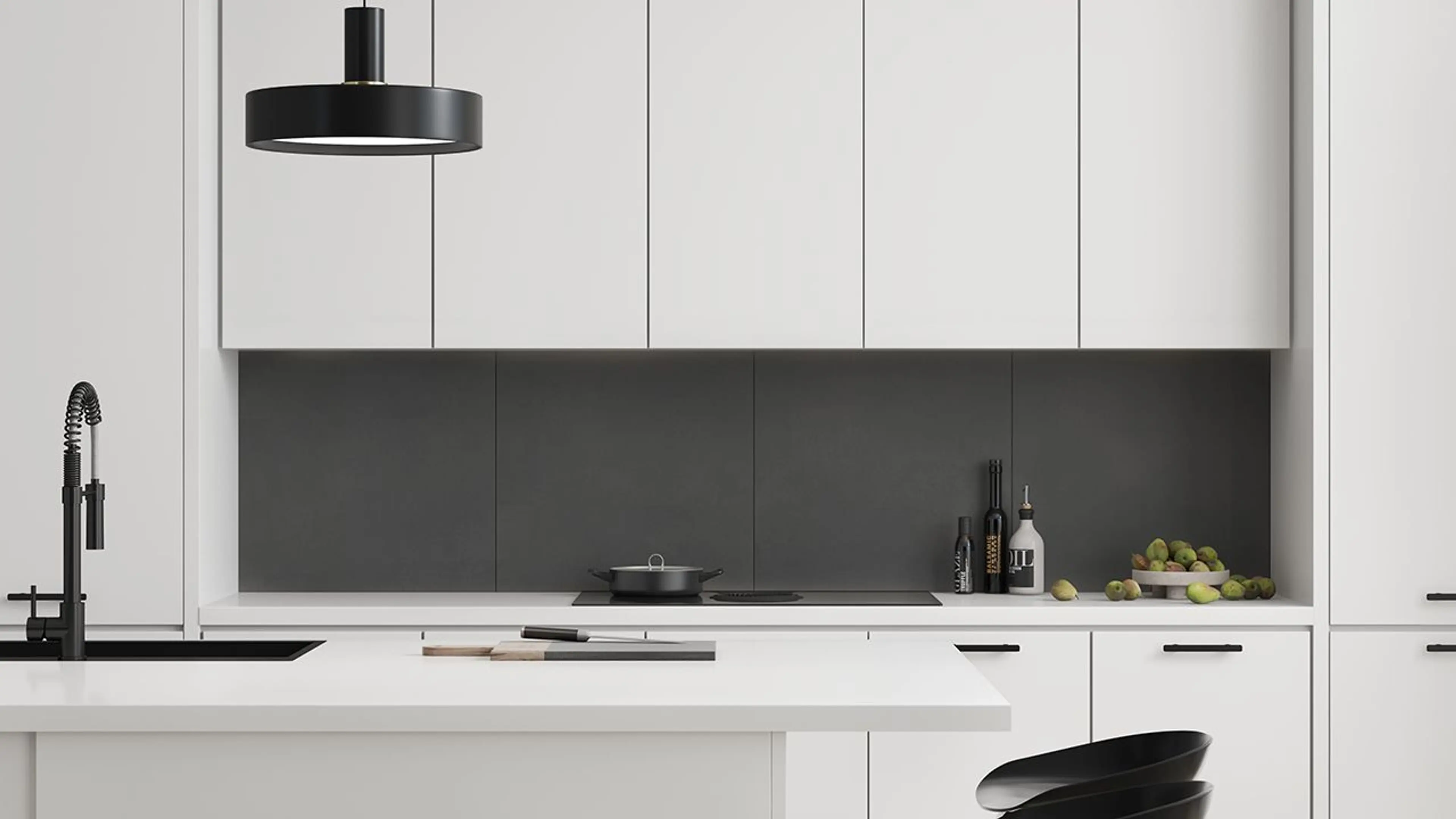 Hvitt kjøkken med sorte detaljer og kjøkkenplate i dark ash fra Fibo.