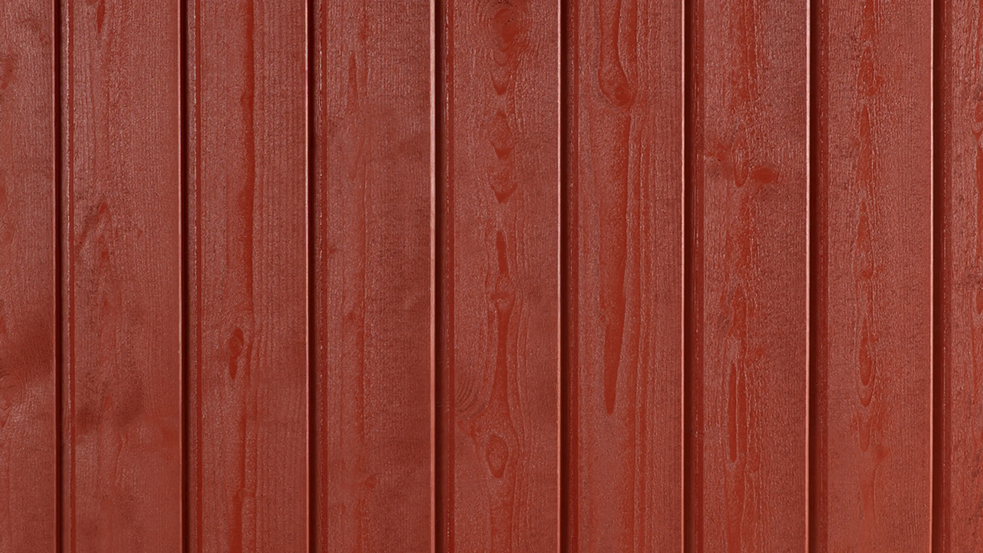 Stående kledning malt med 0025 Rørosrød fra Jotun.