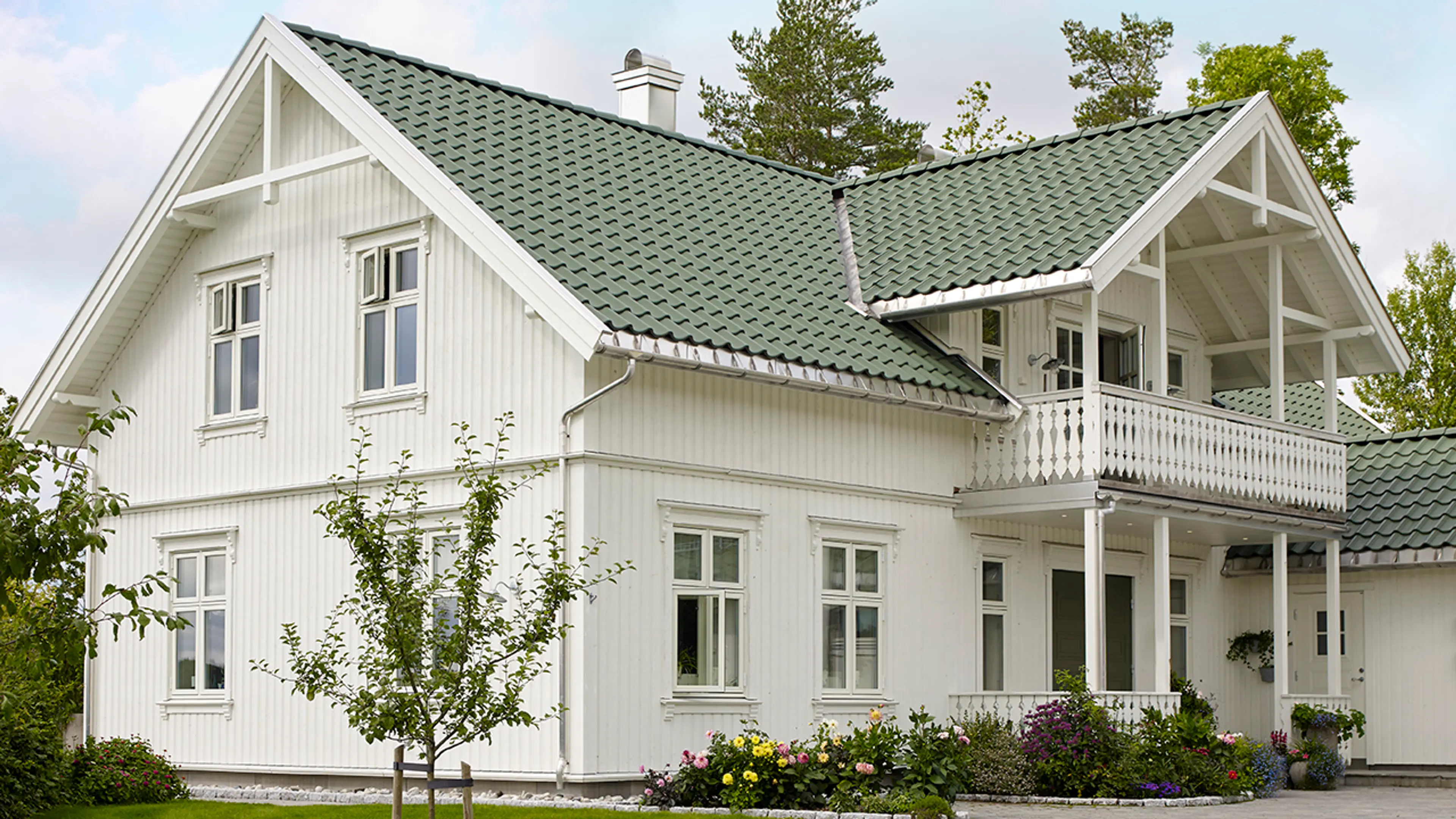 Ny kledning på gammelt hus i fargen 1453 Bomull fra Jotun.