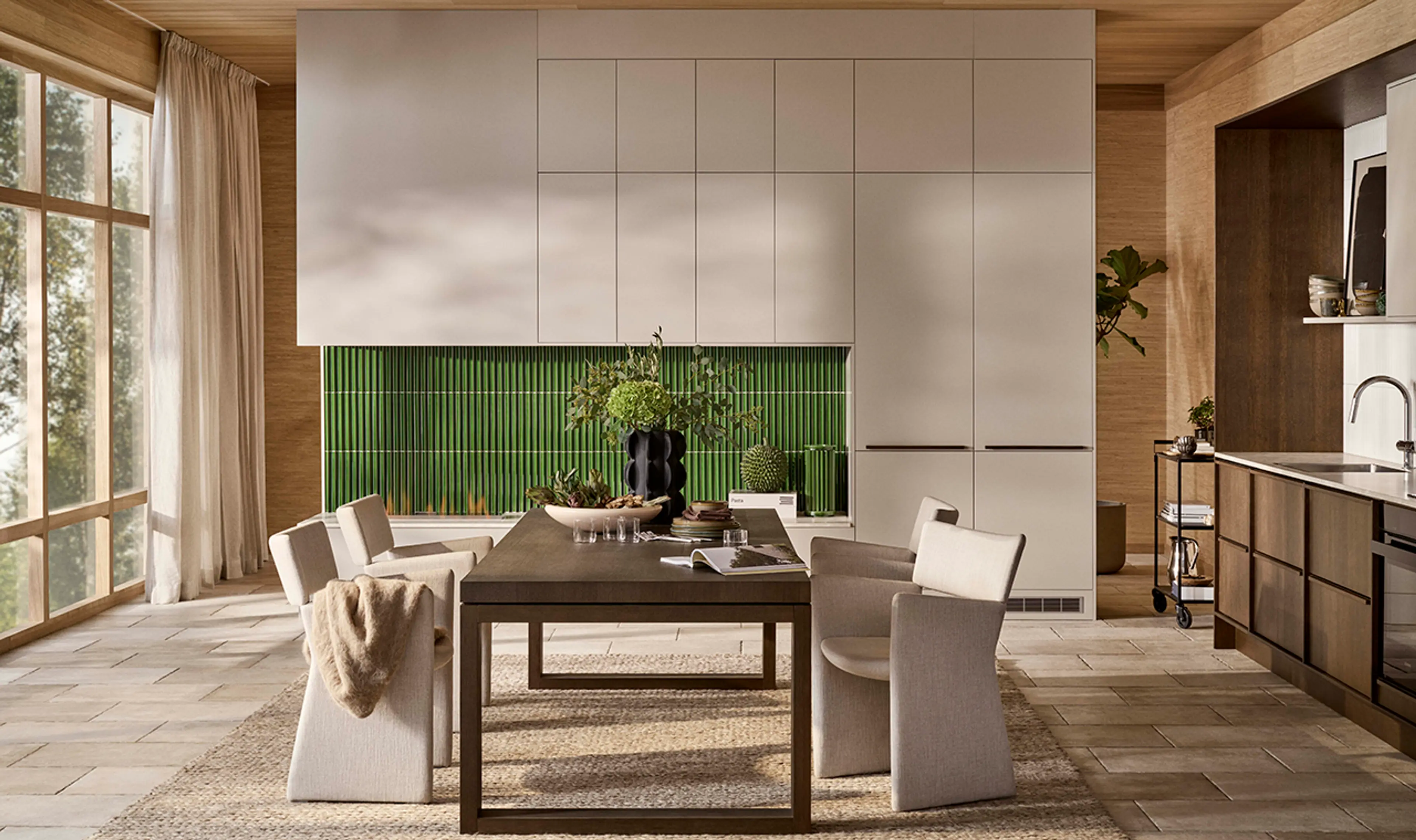 Åpen kjøkkenløsning med peis og spisebord i moderne hjem.