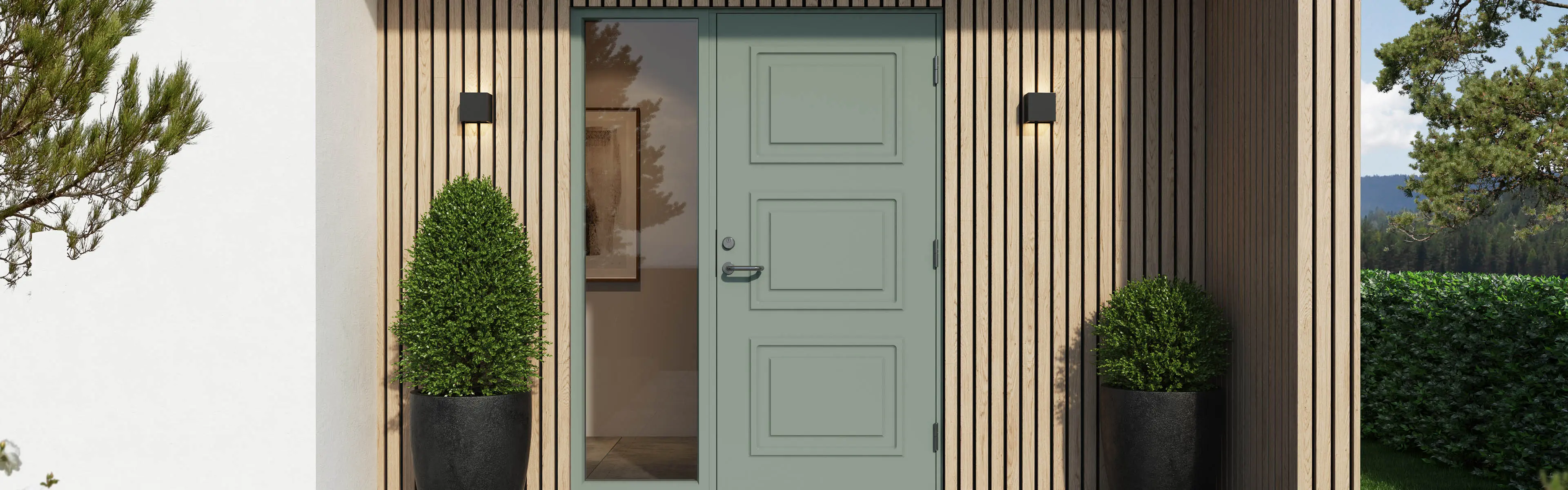 Grønn ytterdør med sidefelt.